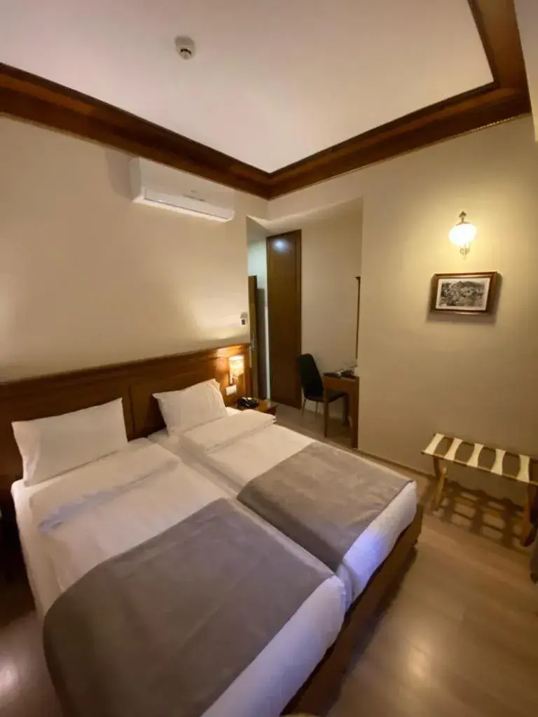 Bed in Hotel Argjiro