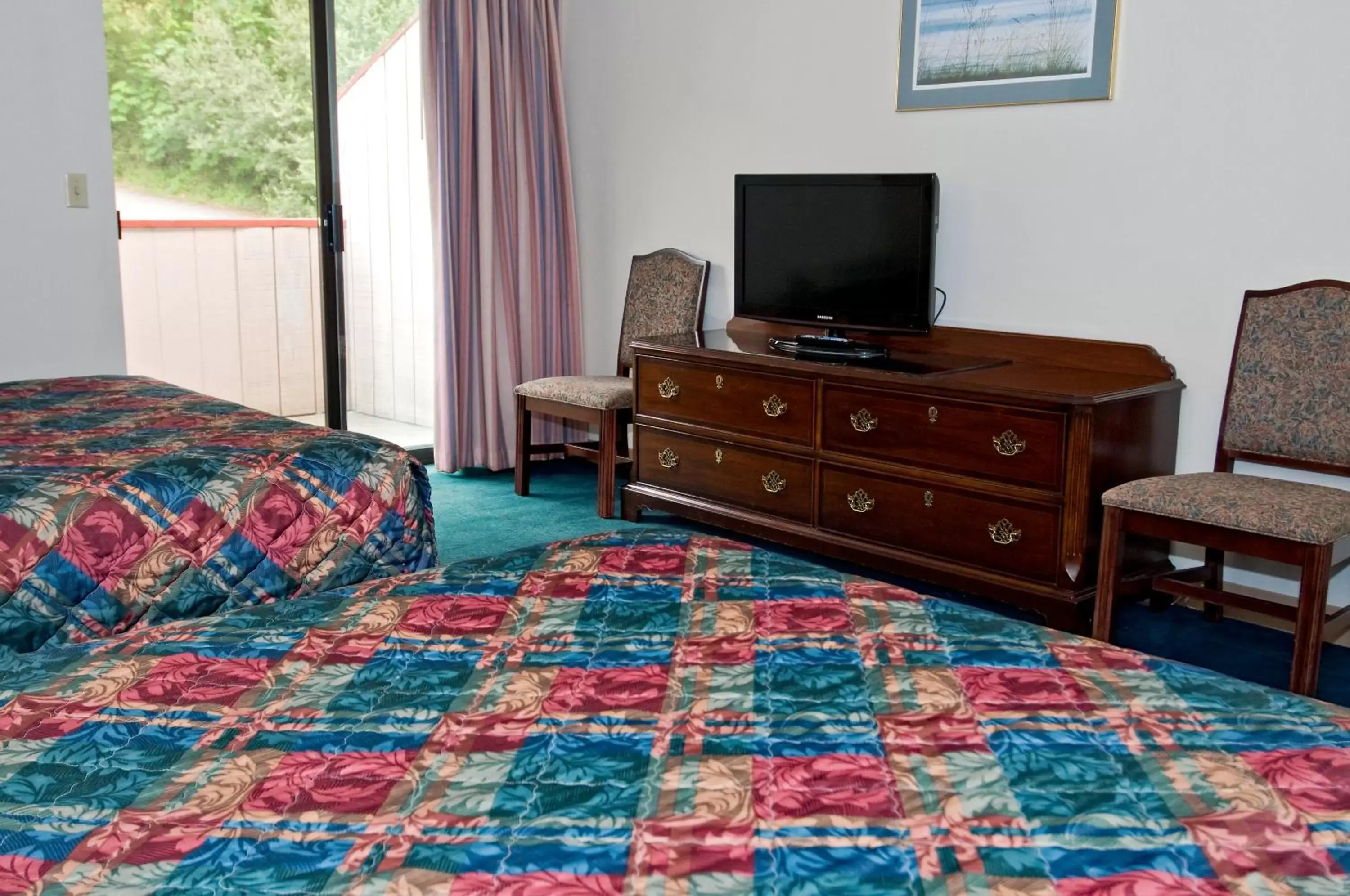 Bedroom, TV/Entertainment Center in Sequim Bay Lodge