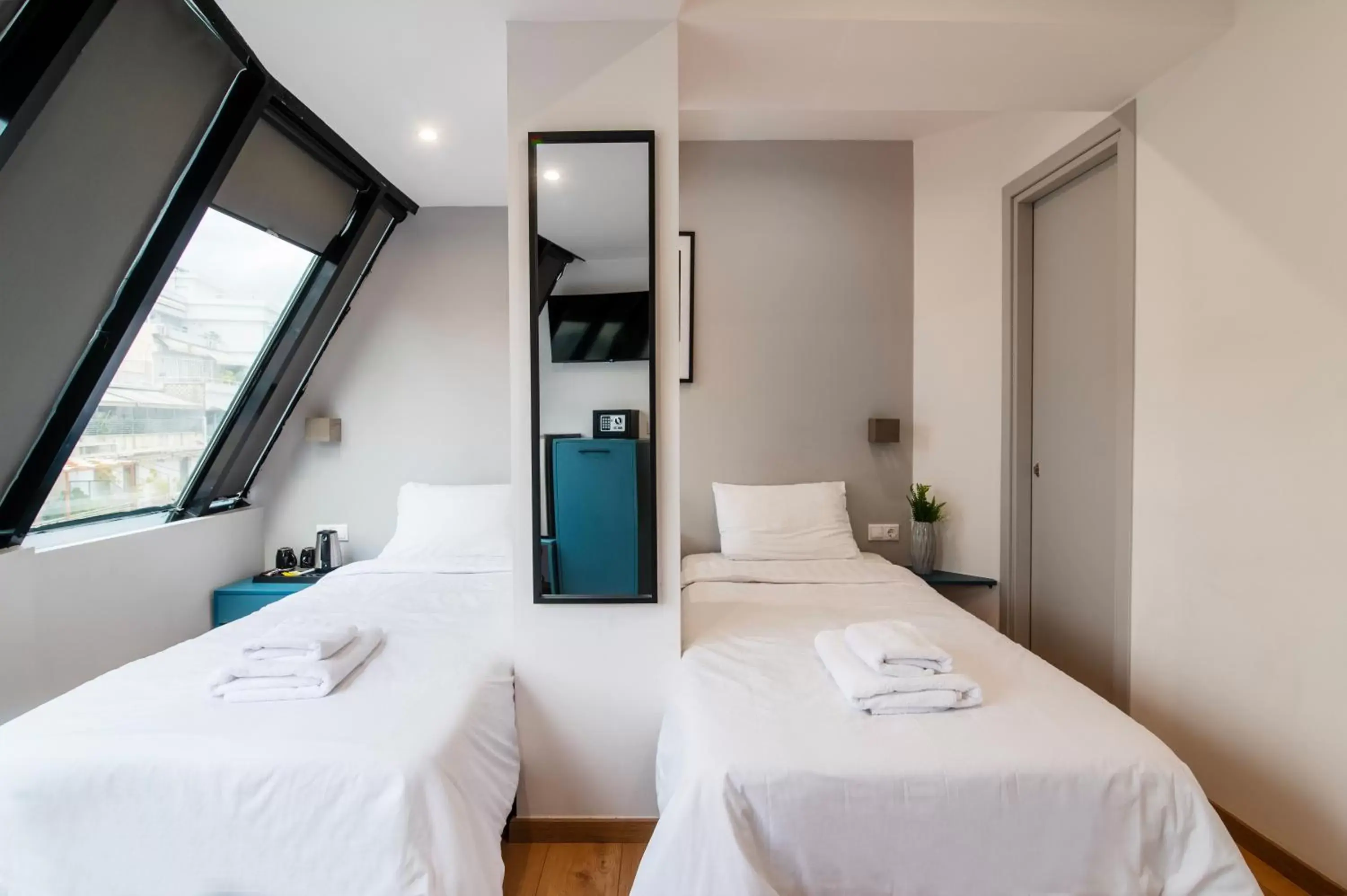 Bed in Olvia Suites