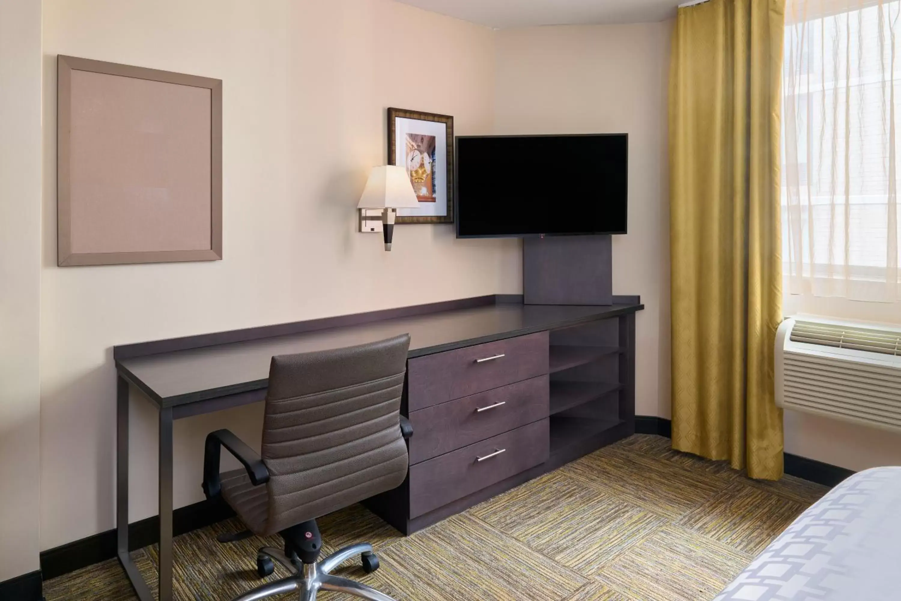 TV and multimedia, Bed in Candlewood Suites NYC -Times Square by IHG TV and multimedia, Bed in Candlewood Suites NYC -Times Square by IHG