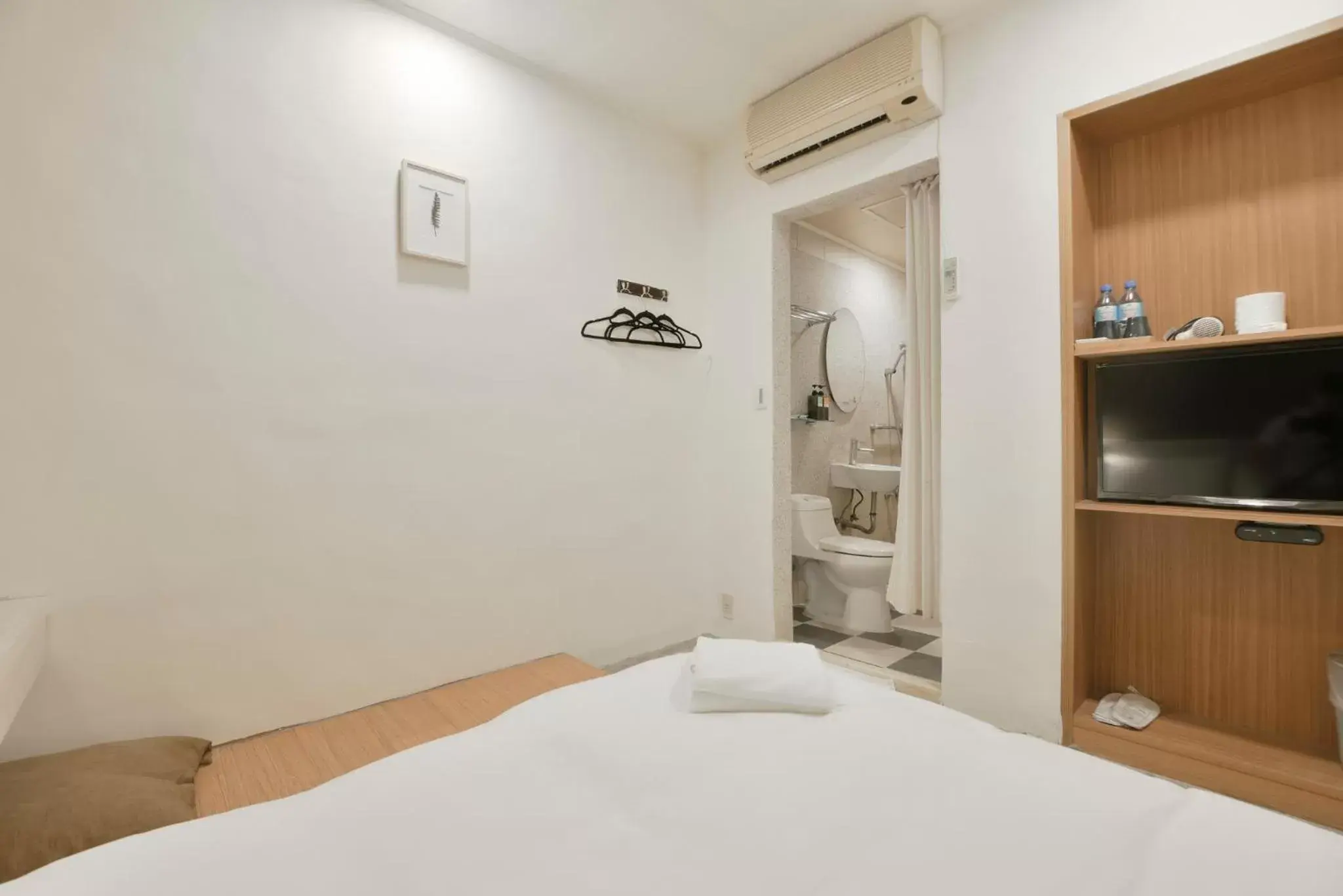 Bed in Raise Hotel Taichung