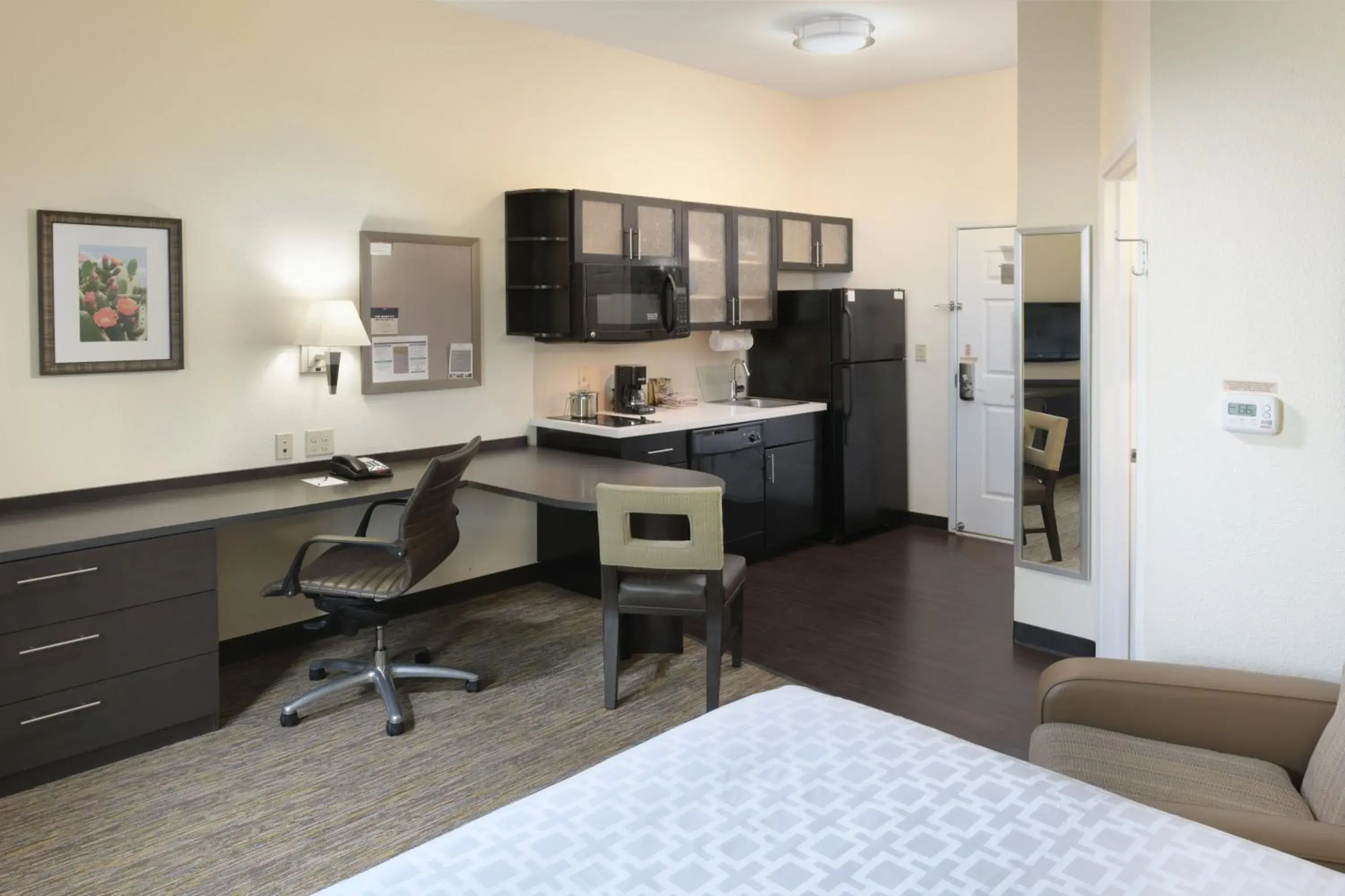 Photo of the whole room, Kitchen/Kitchenette in Candlewood Suites Odessa, an IHG Hotel