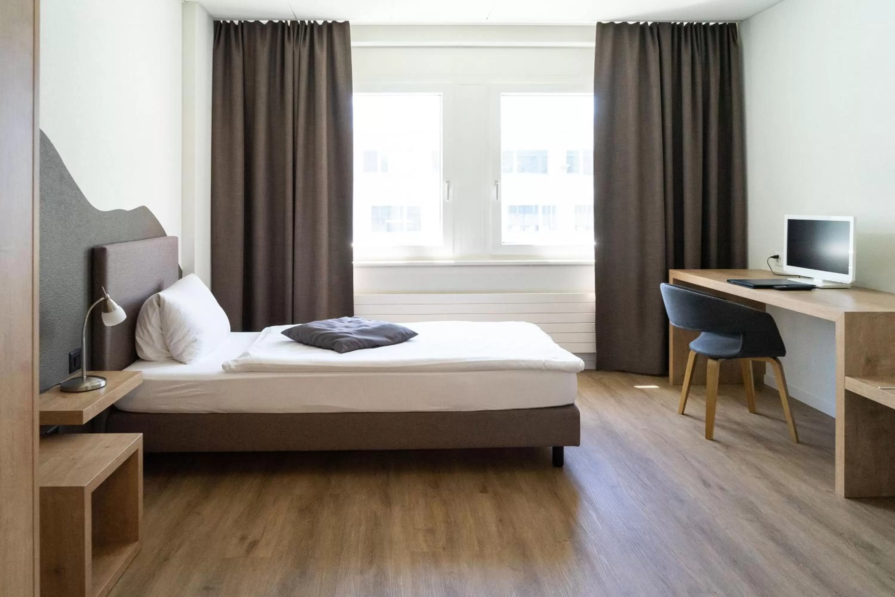 Bed in Tailormade Hotel STANS SÜD