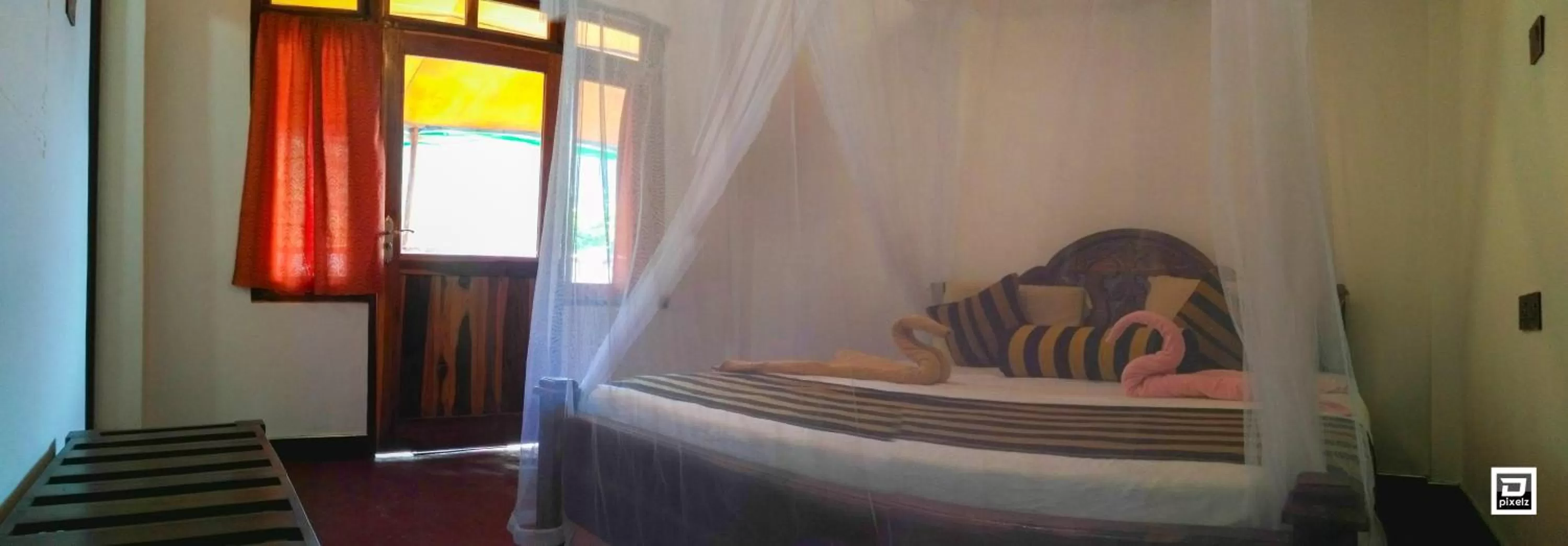 Bed in Ella River Face Inn