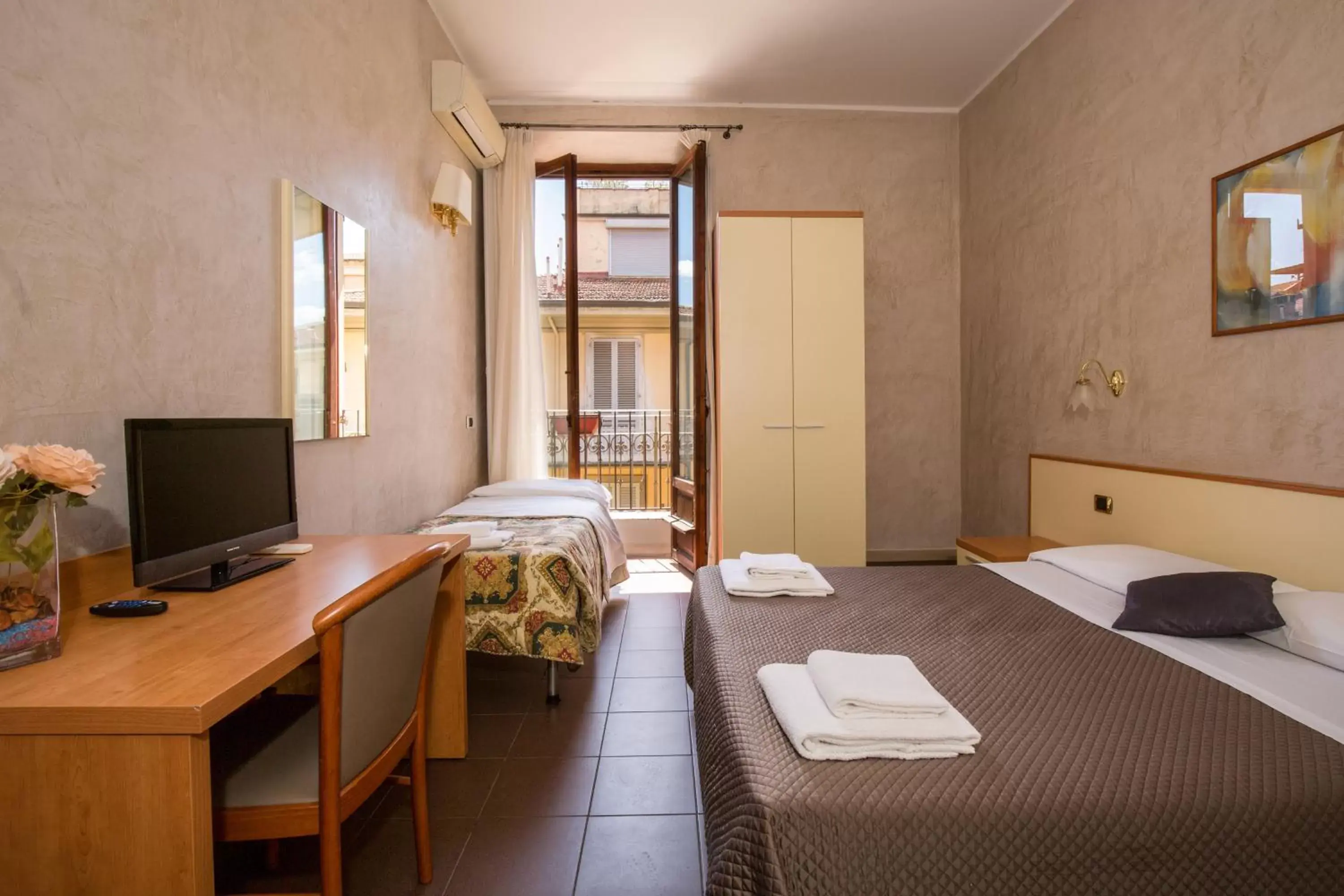 Photo of the whole room, Bed in Hotel Angelica " Stazione Santa Maria Novella "