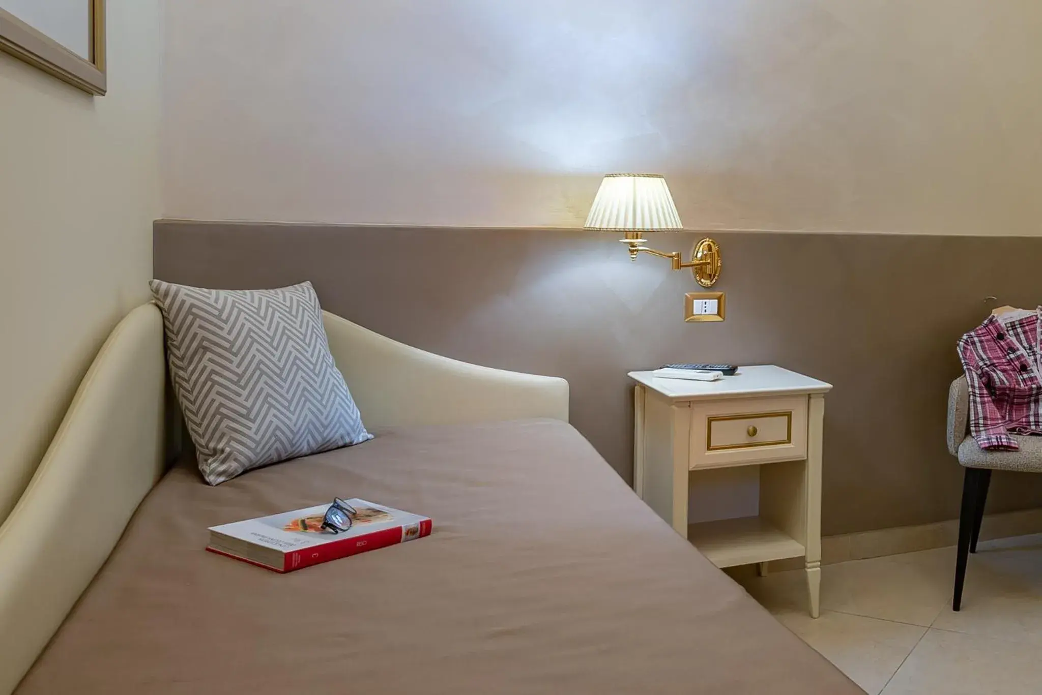 Bed in Vittorio Emanuele Boutique Hotel