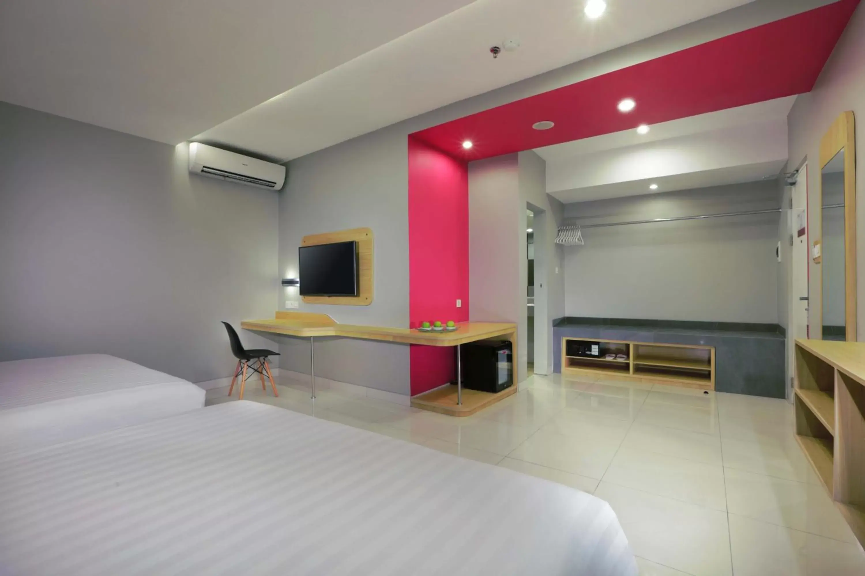 Photo of the whole room, TV/Entertainment Center in favehotel Ahmad Yani Banjarmasin