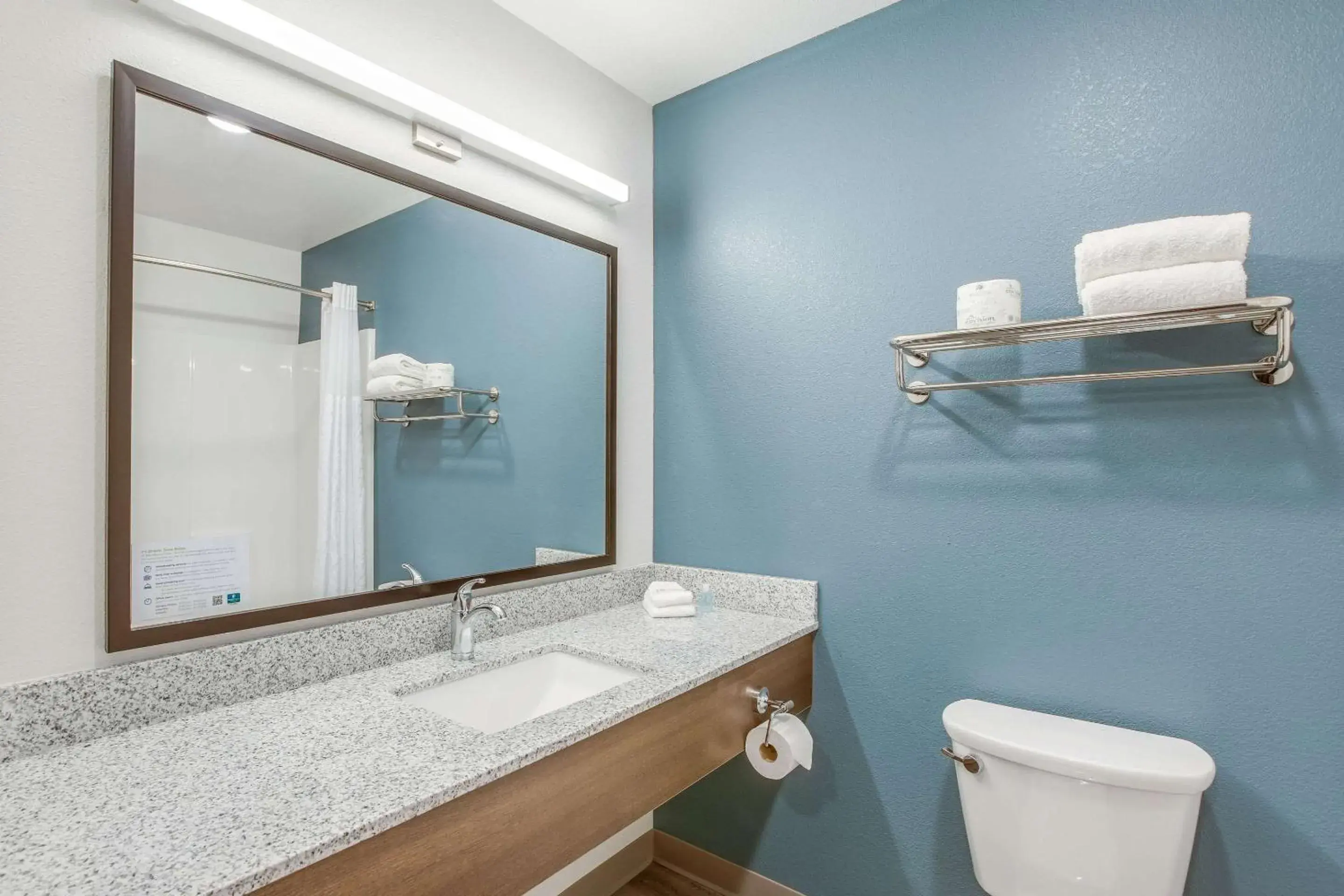 Bathroom in WoodSpring Suites Detroit Farmington Hills