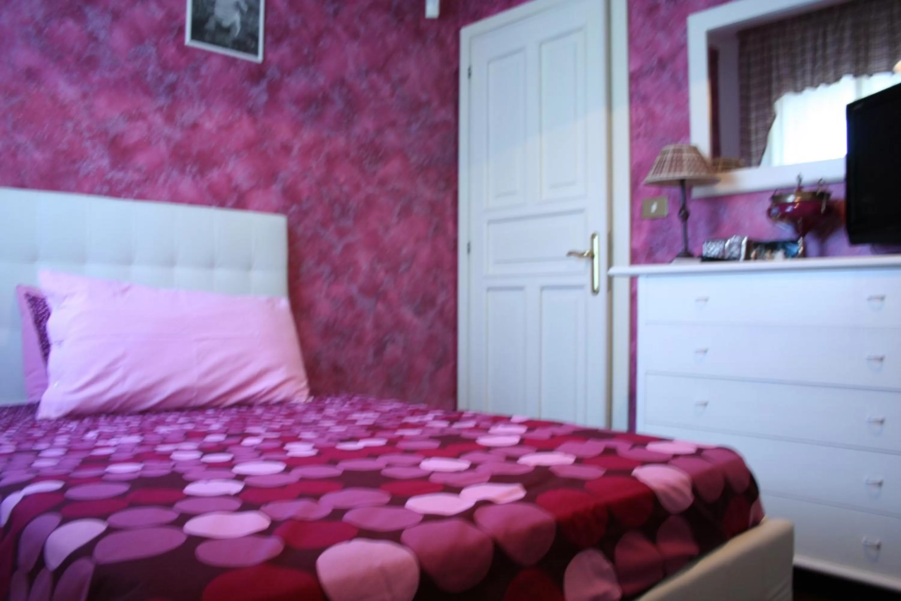 Bed in The Incantation Guest House