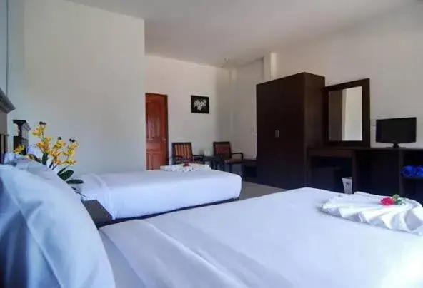 Bed in Veranda Lanta Resort
