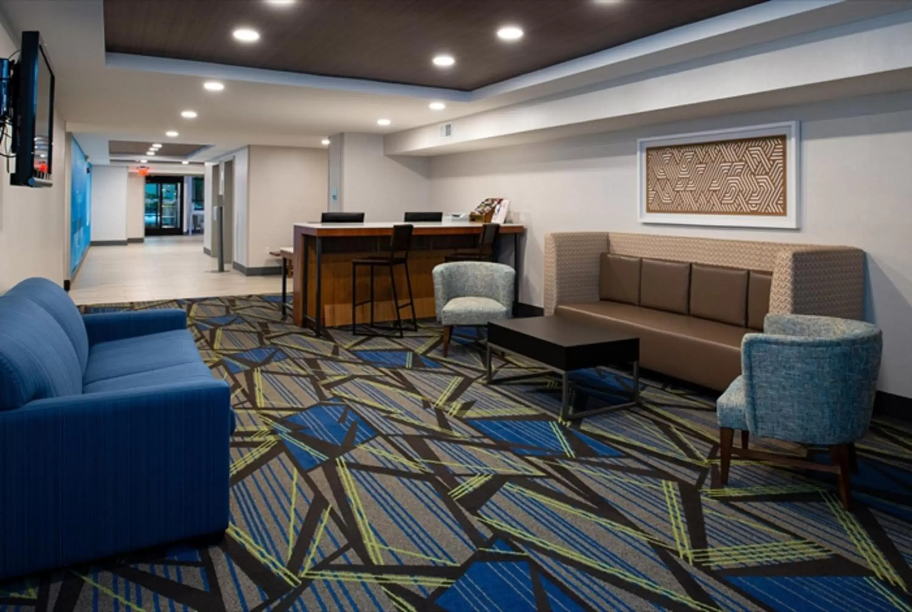 Property building, Seating Area in Holiday Inn Express Cincinnati West, an IHG Hotel