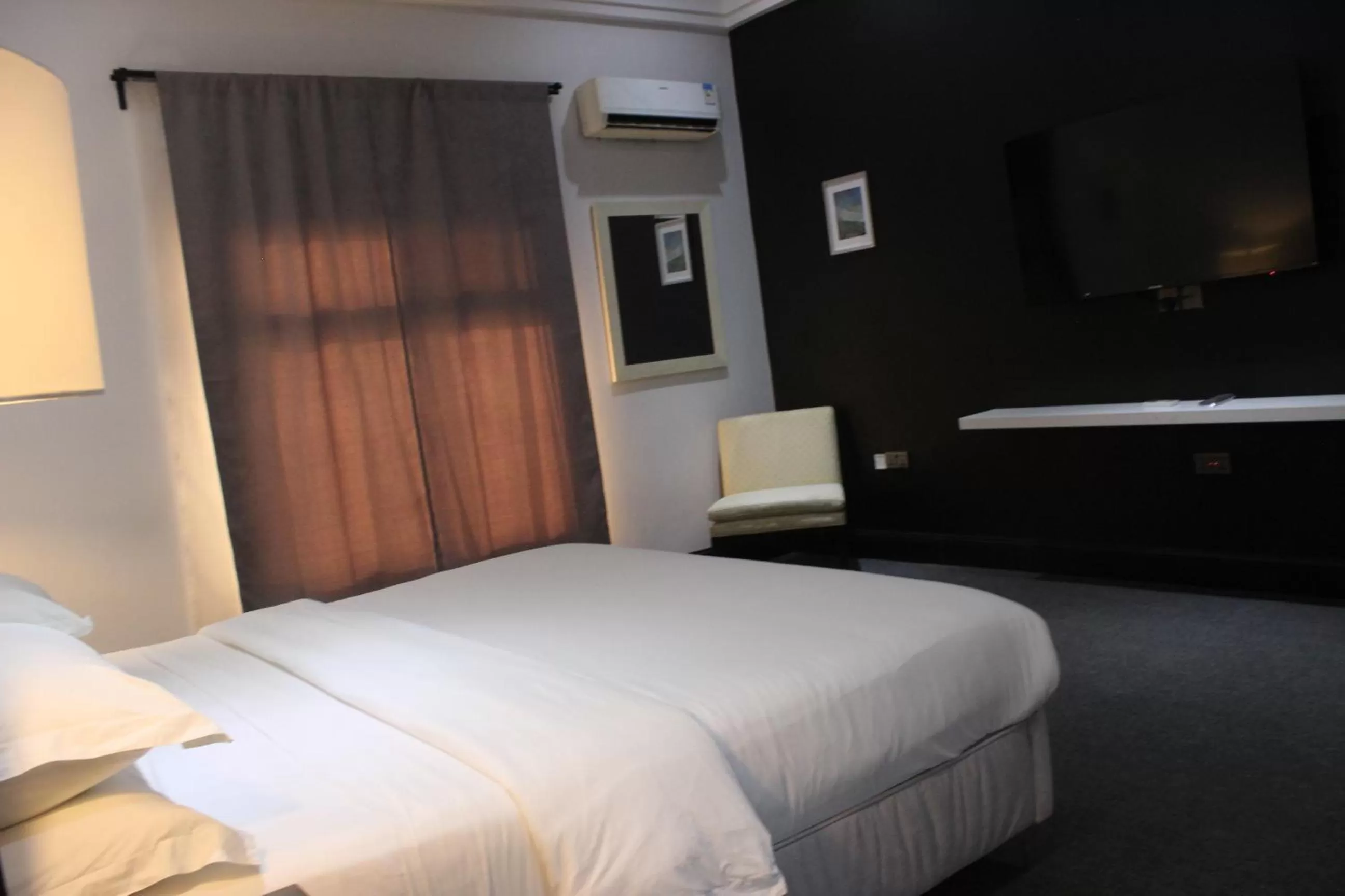 Bed in MUSE Boutique Hotel