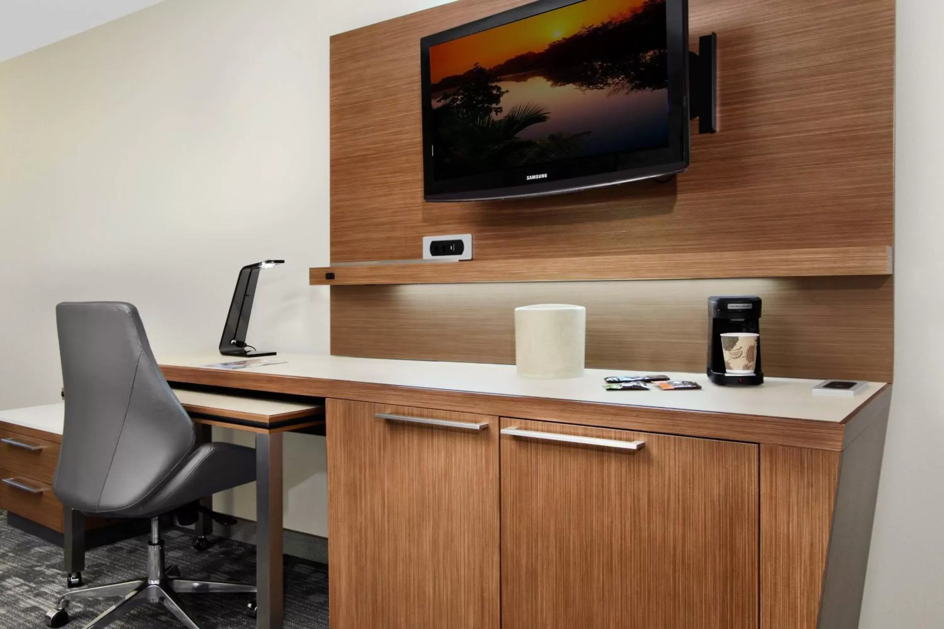 Photo of the whole room, TV/Entertainment Center in Courtyard by Marriott Cocoa Beach Cape Canaveral