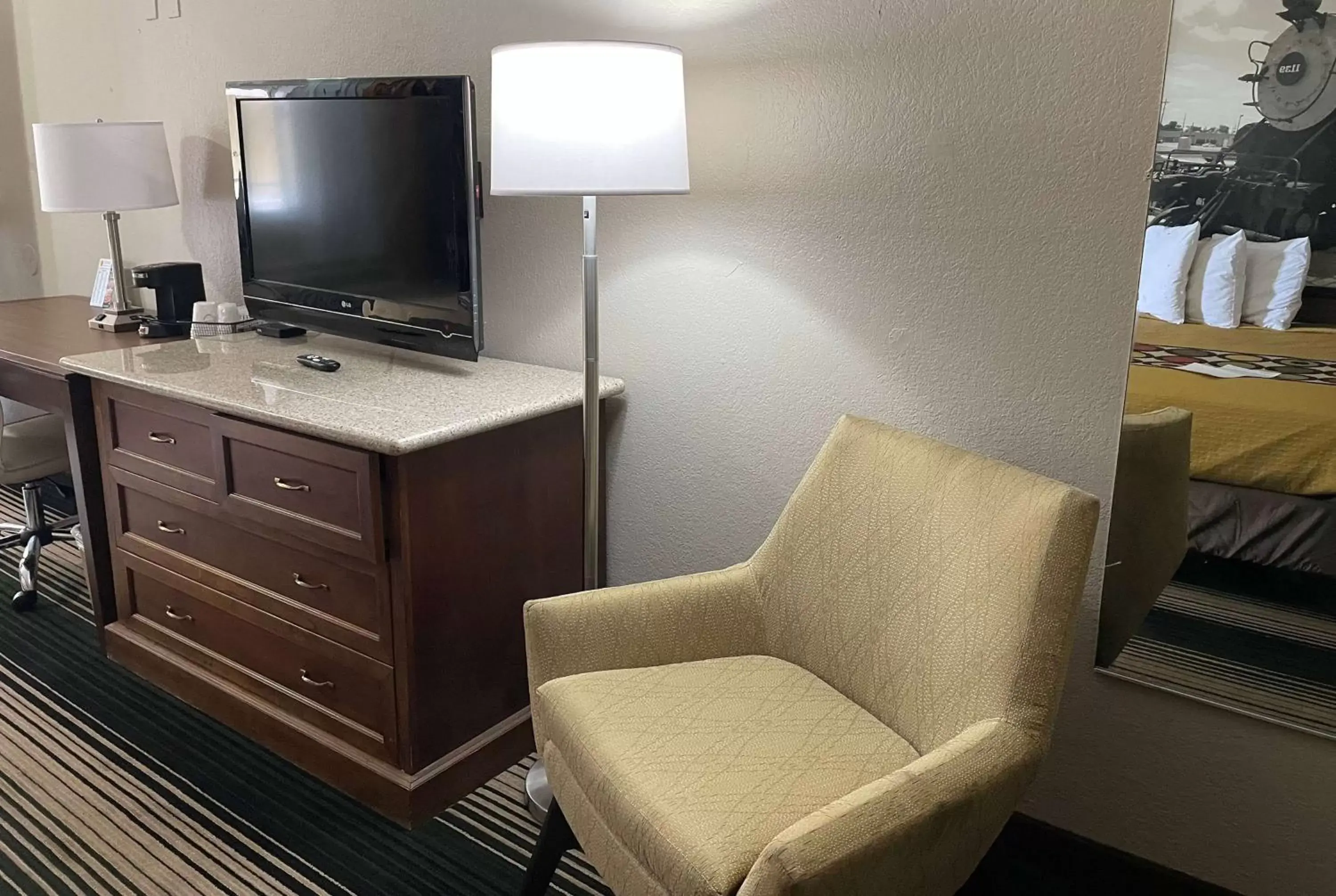 Photo of the whole room, TV/Entertainment Center in Super 8 by Wyndham Junction City