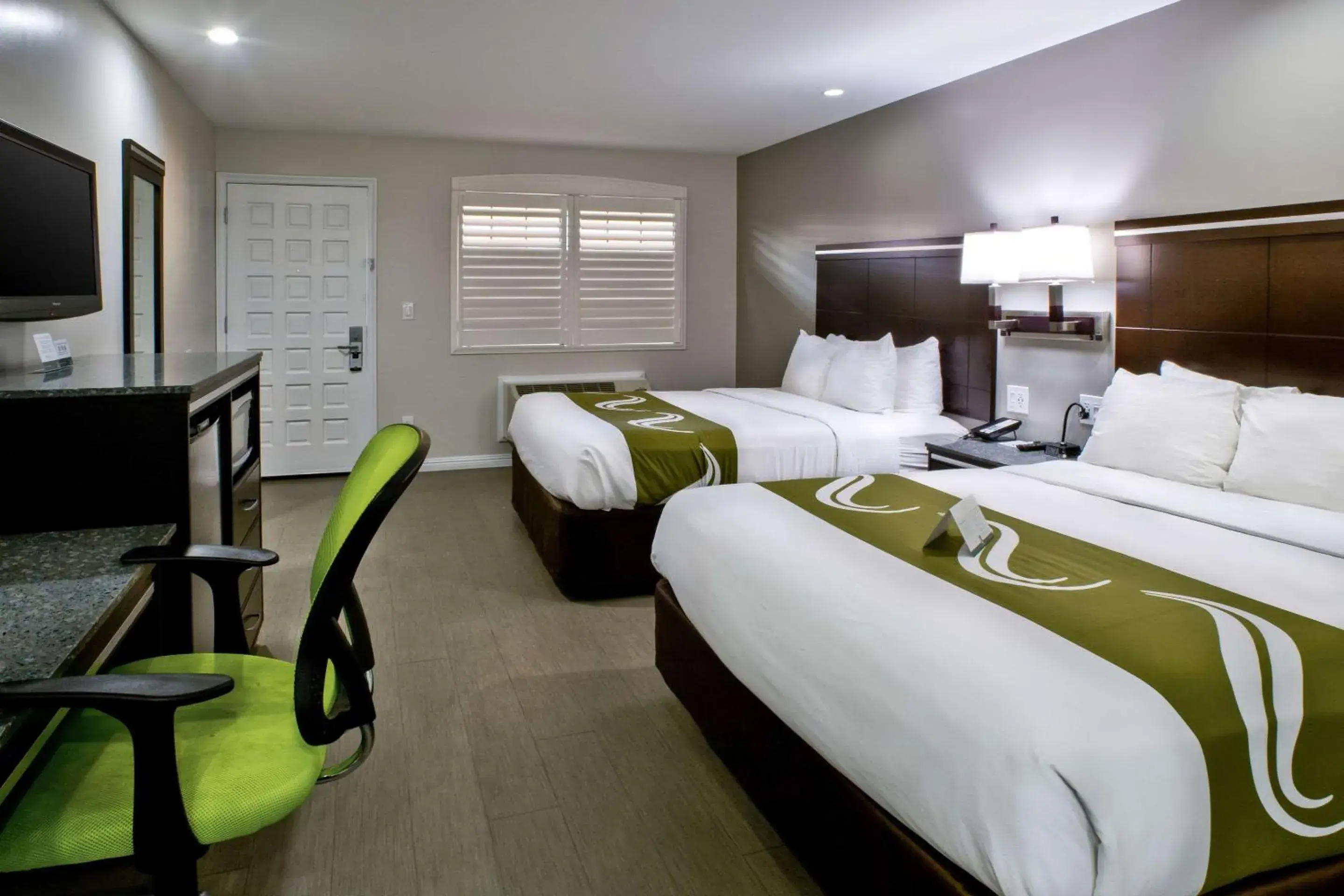 Photo of the whole room, Bed in Bay Area Inn & Suites Photo of the whole room, Bed in Bay Area Inn & Suites