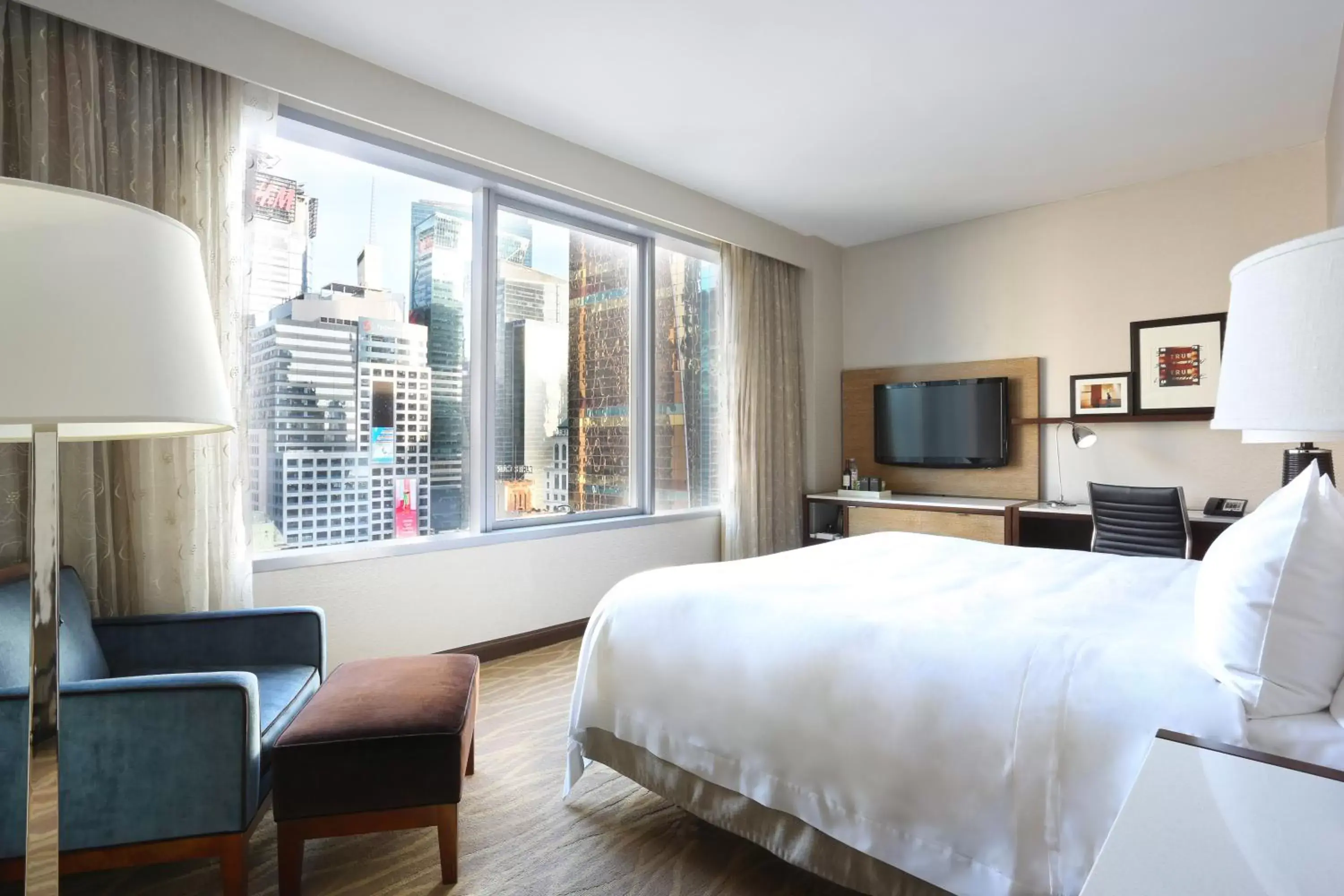 Guests, Bed in InterContinental New York Times Square by IHG Guests, Bed in InterContinental New York Times Square by IHG