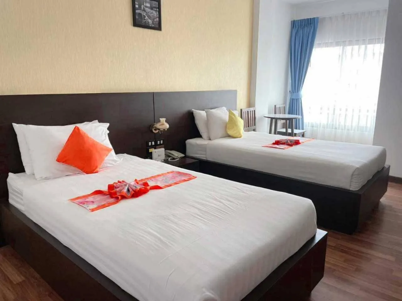 Bed in Jingjit Hotel