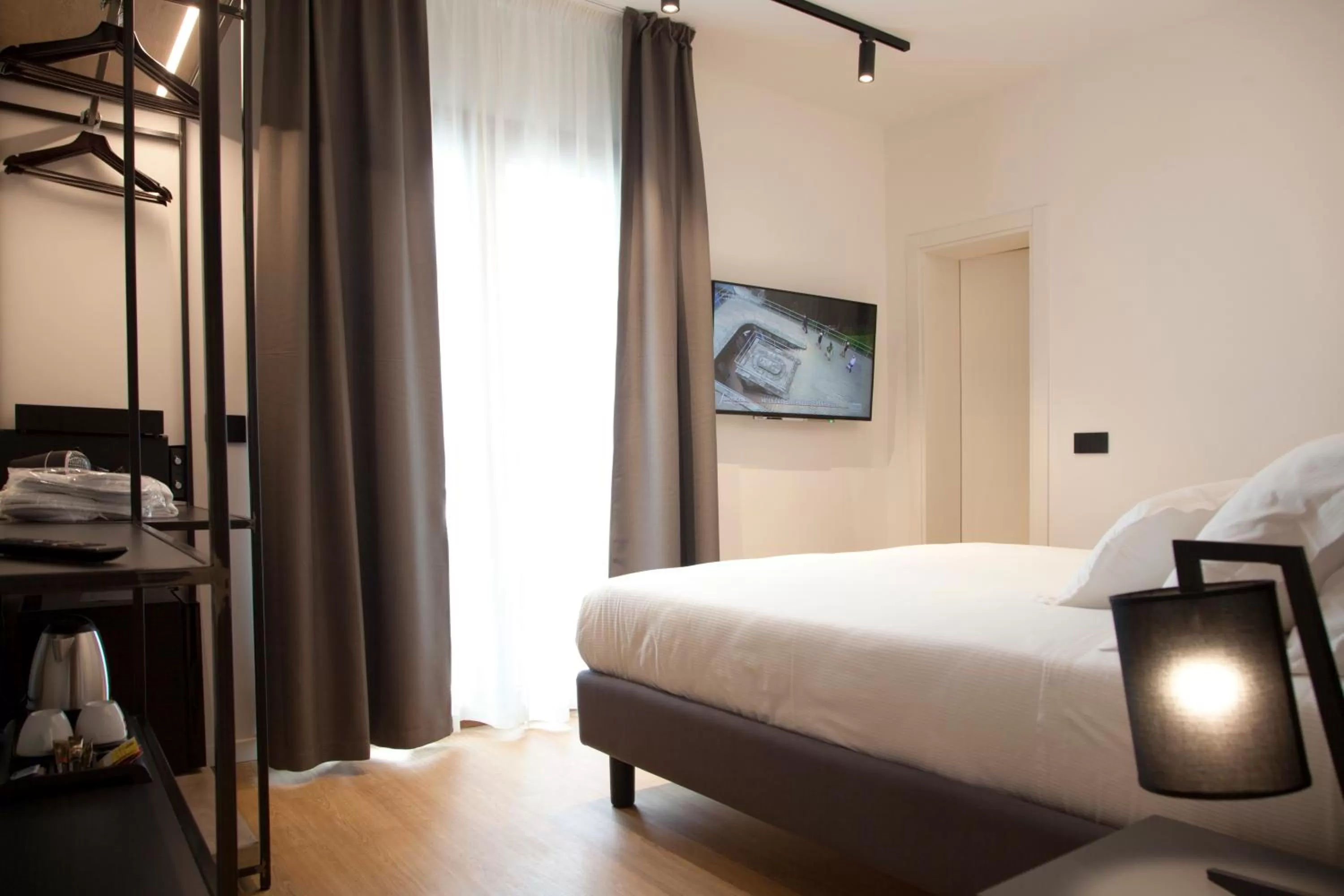 Bed in Meg Lifestyle Hotel & Apartaments