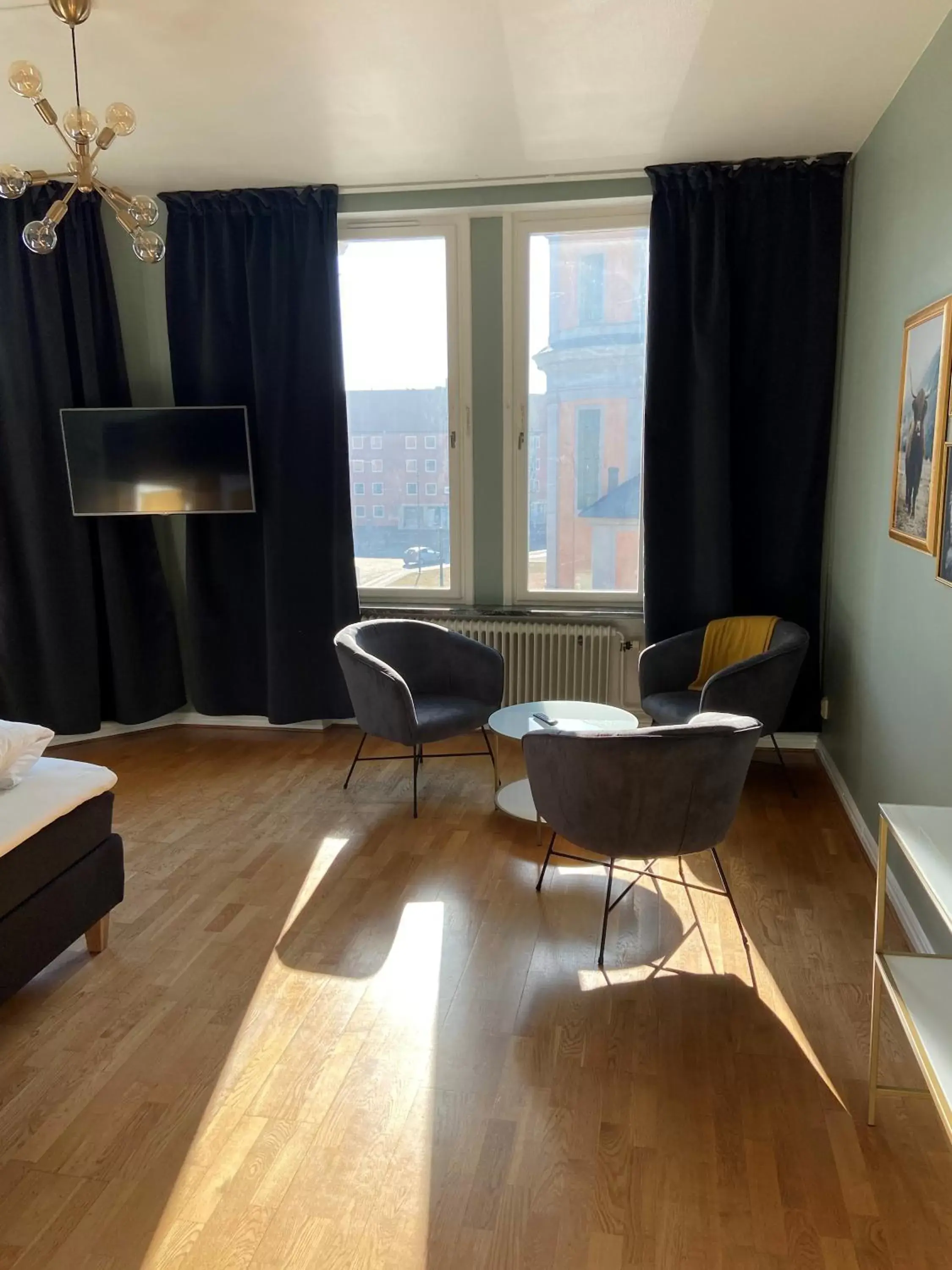 Bedroom, Seating Area in First Hotel Statt