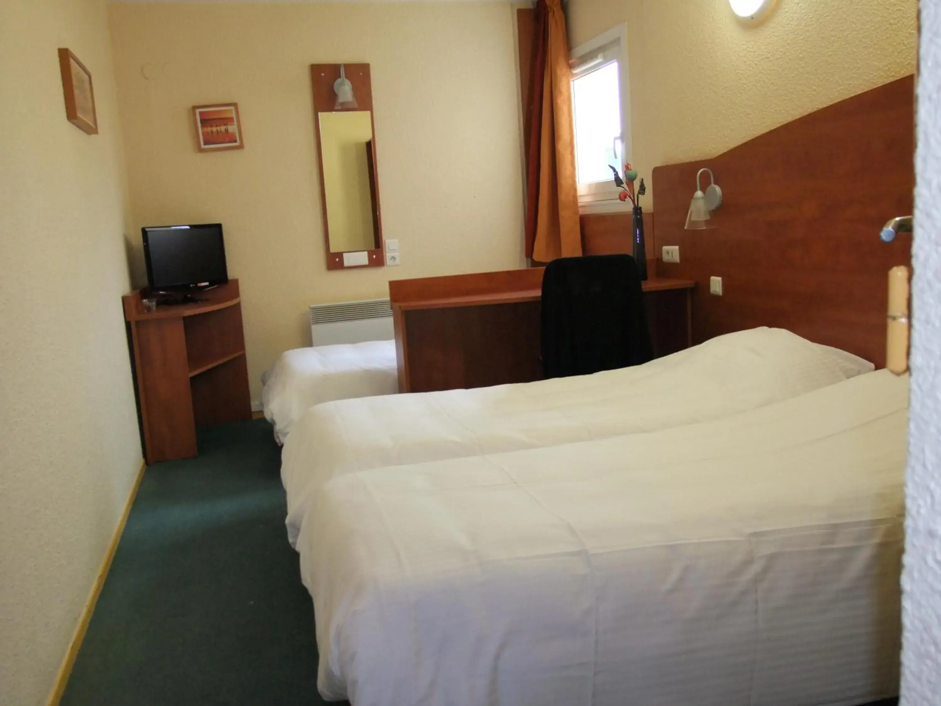 Bed in Adams Hotel