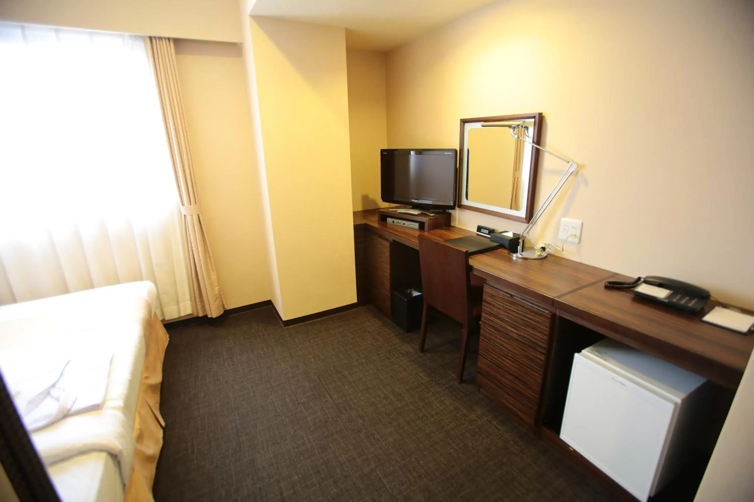 Photo of the whole room, TV/Entertainment Center in International Hotel Ube