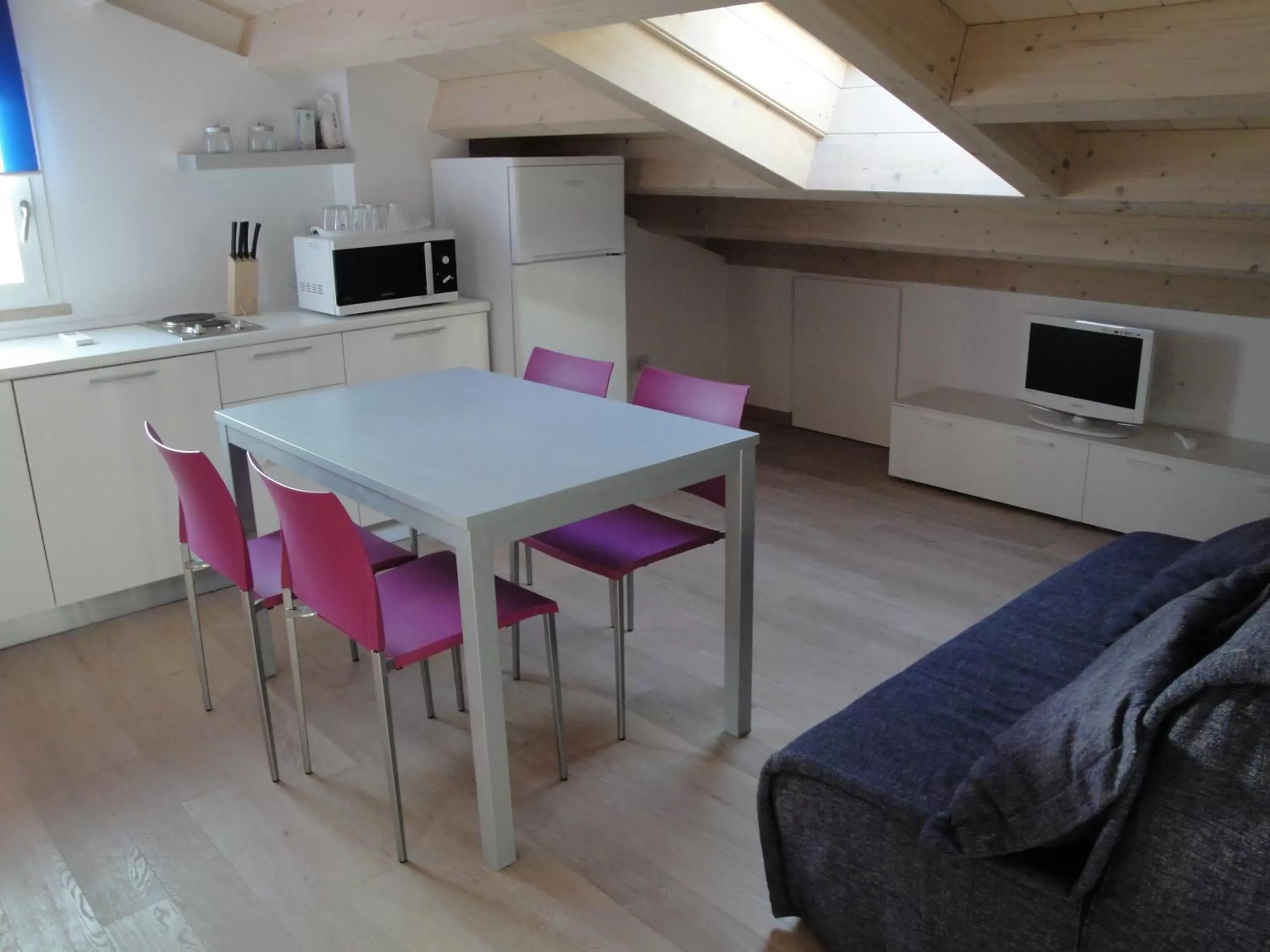 Communal lounge/ TV room, Kitchen/Kitchenette in Residence La Nave