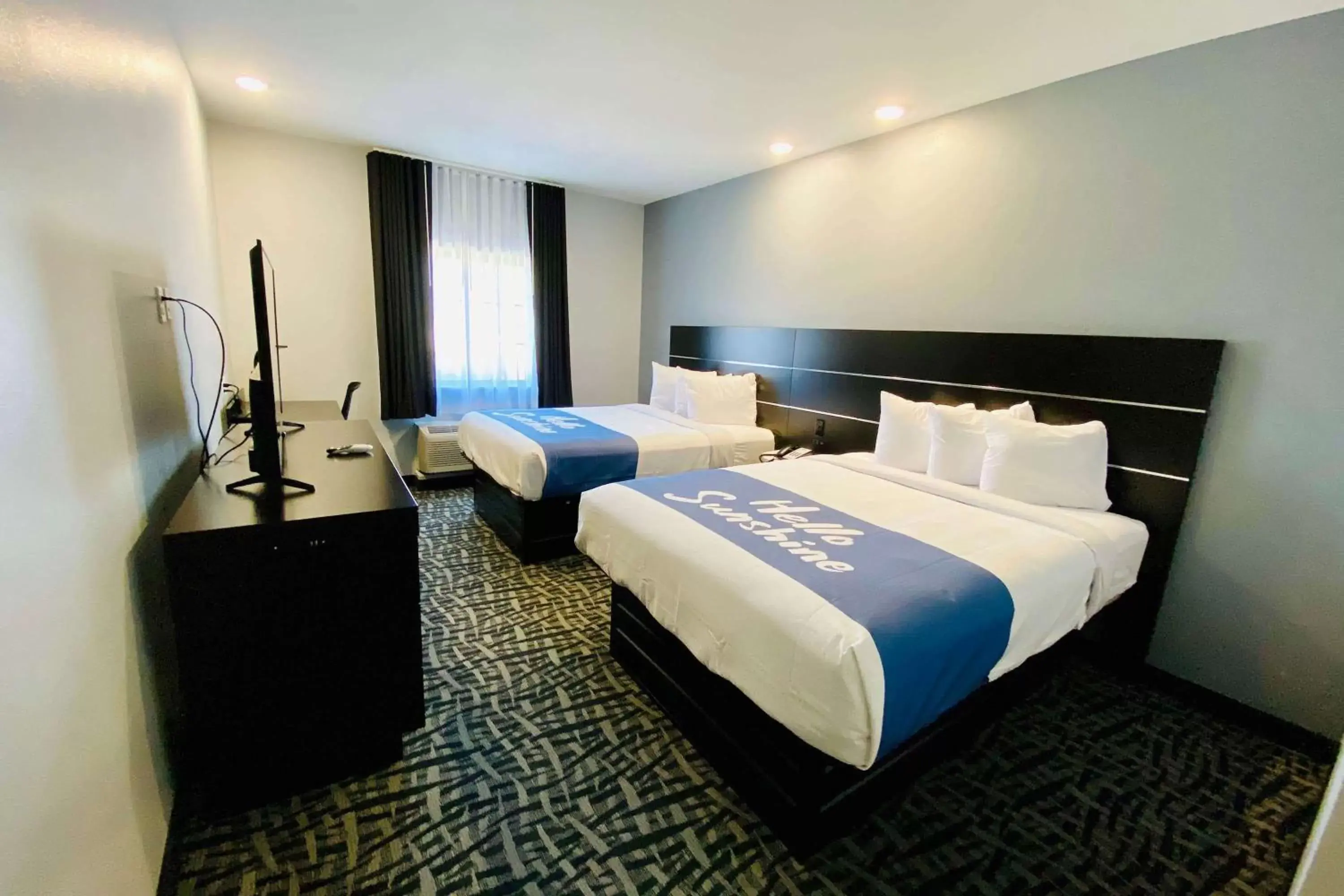 Photo of the whole room, Bed in Days Inn & Suites by Wyndham Horn Lake - Memphis Graceland