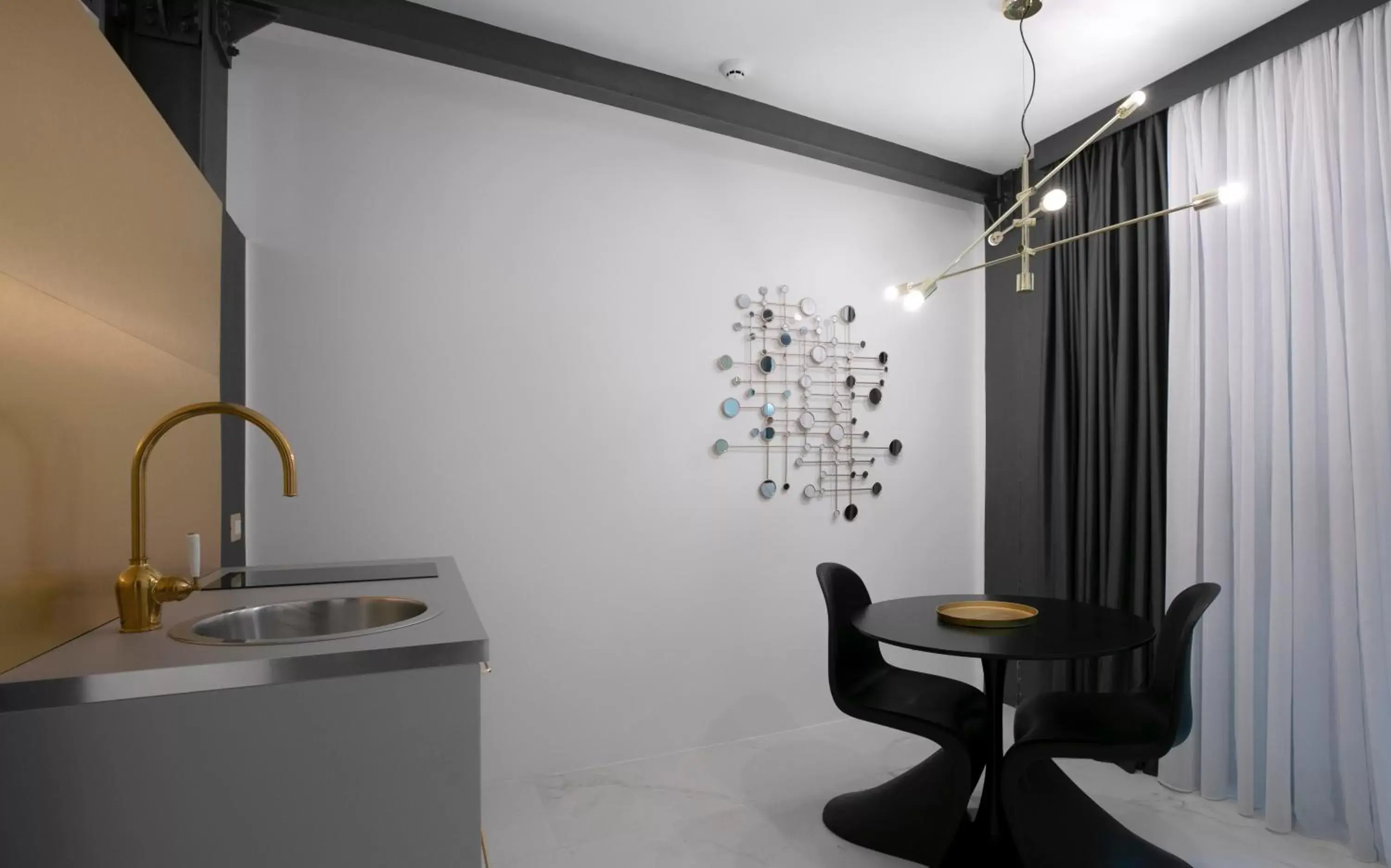 Kitchen or kitchenette in Azzoli Trapani - Apartments&Skypool - Adults Only Kitchen or kitchenette in Azzoli Trapani - Apartments&Skypool - Adults Only