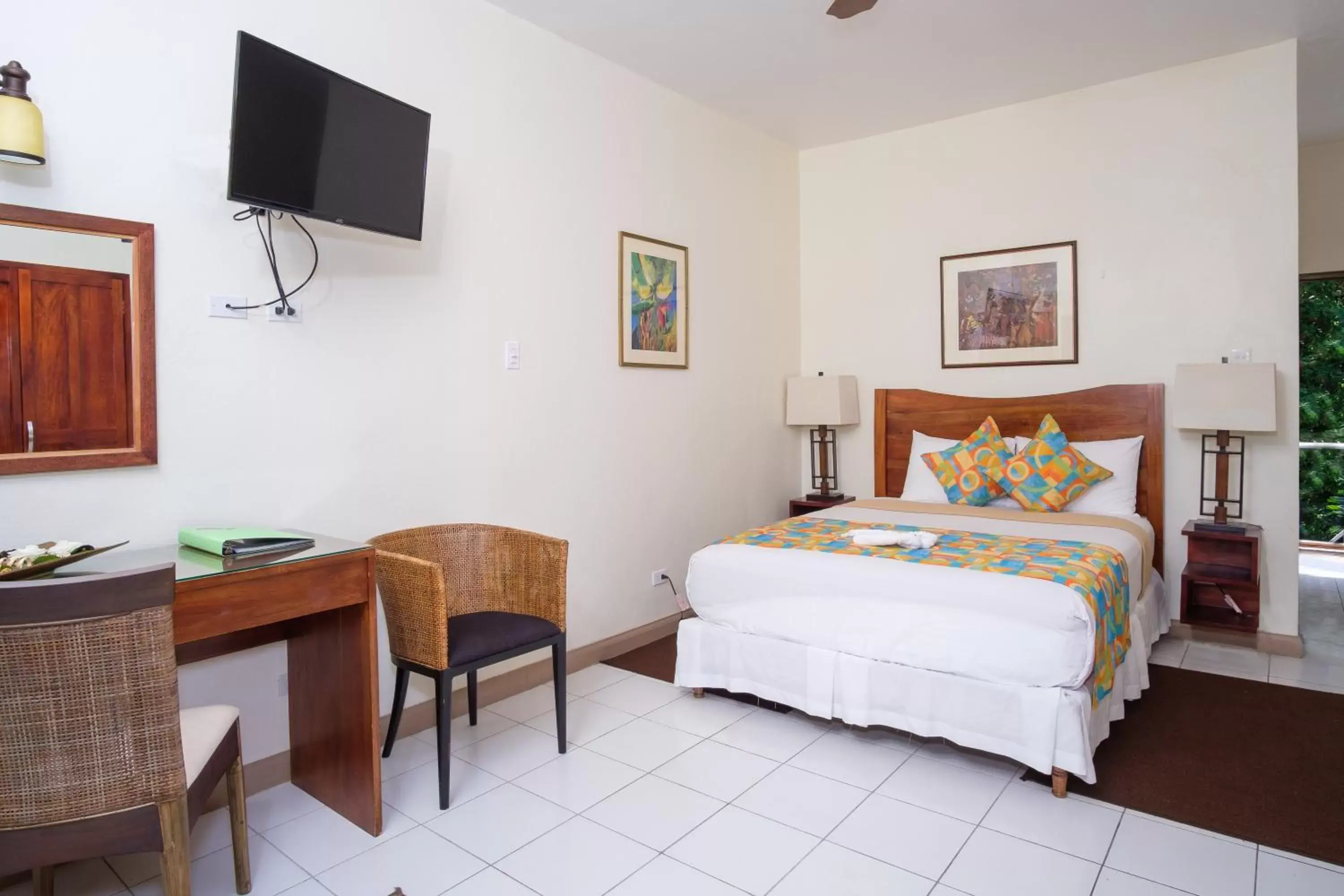 Bedroom, Bed in Hibiscus Lodge Hotel