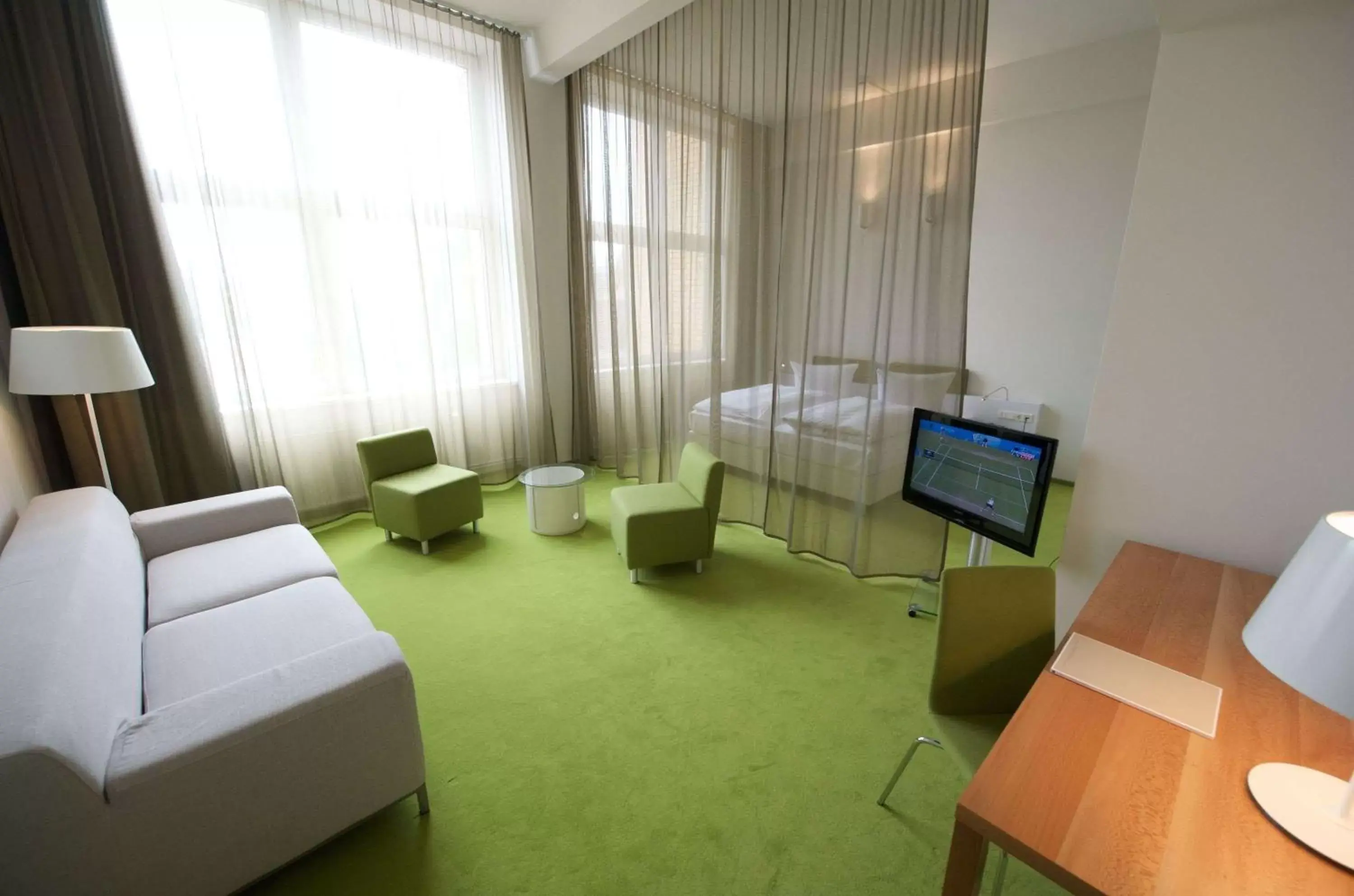 Photo of the whole room, Seating Area in Wyndham Garden Berlin Mitte