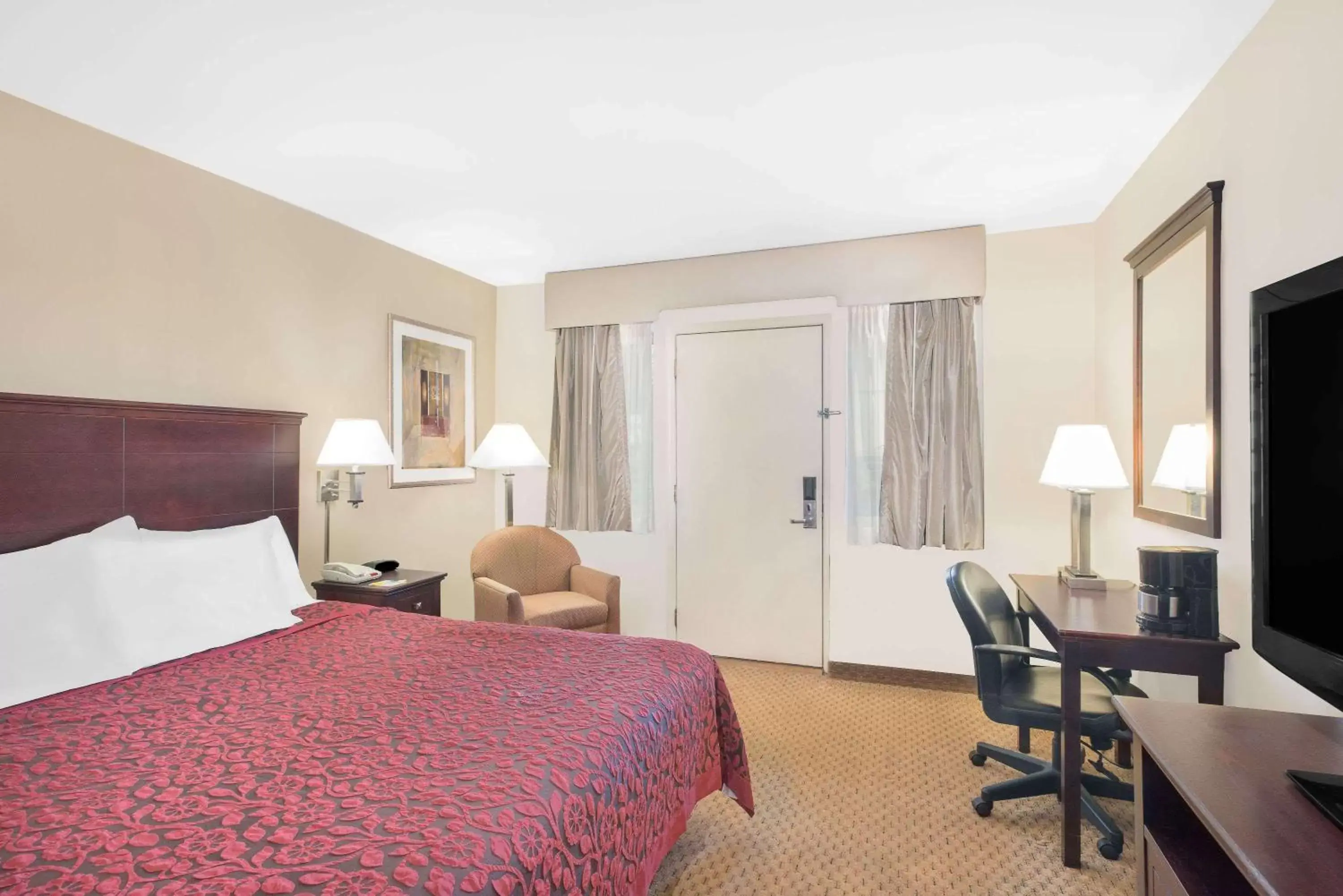 Photo of the whole room, Bed in Days Inn by Wyndham Springfield/Phil.Intl Airport