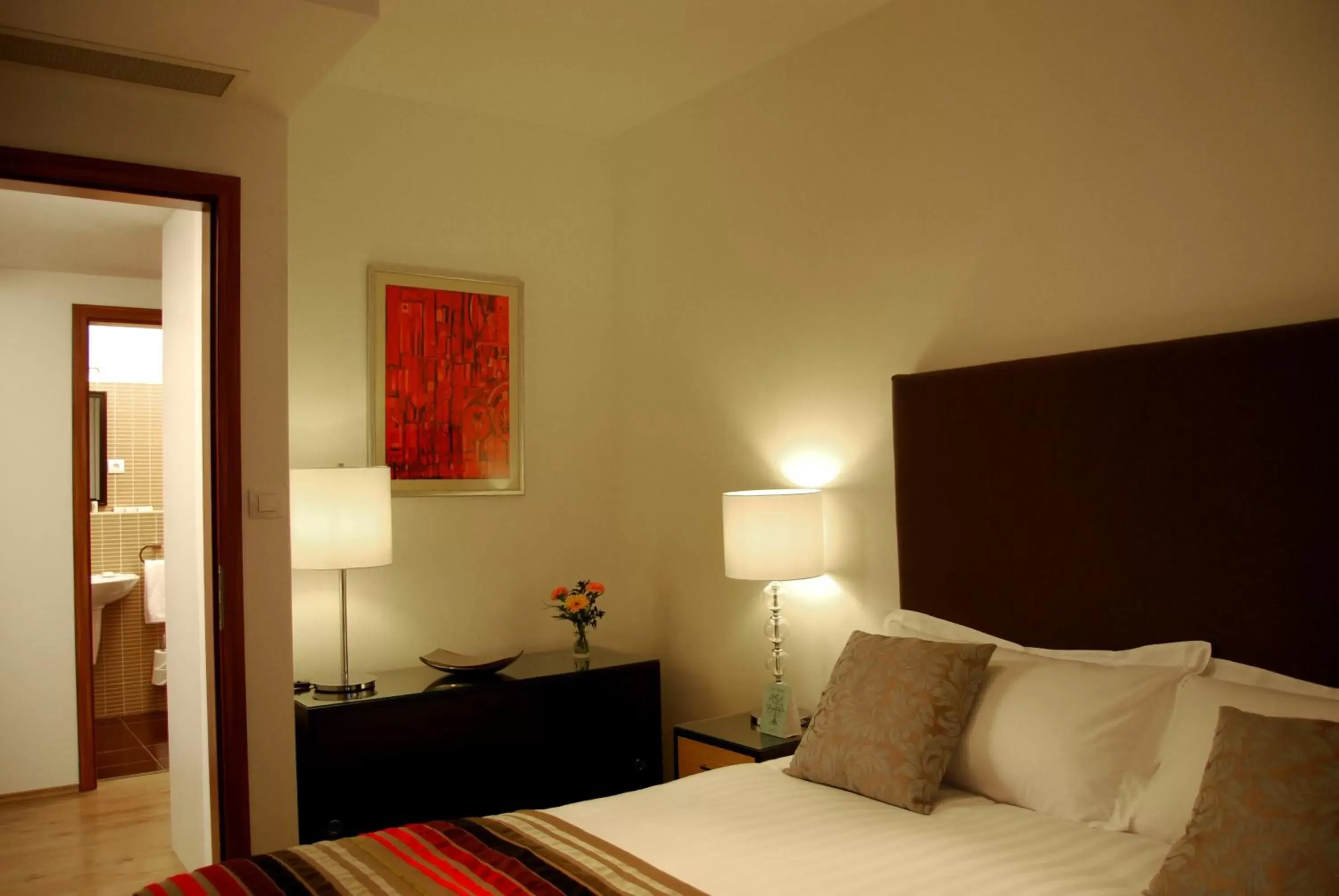 Bed in Escala Hotel & Suites