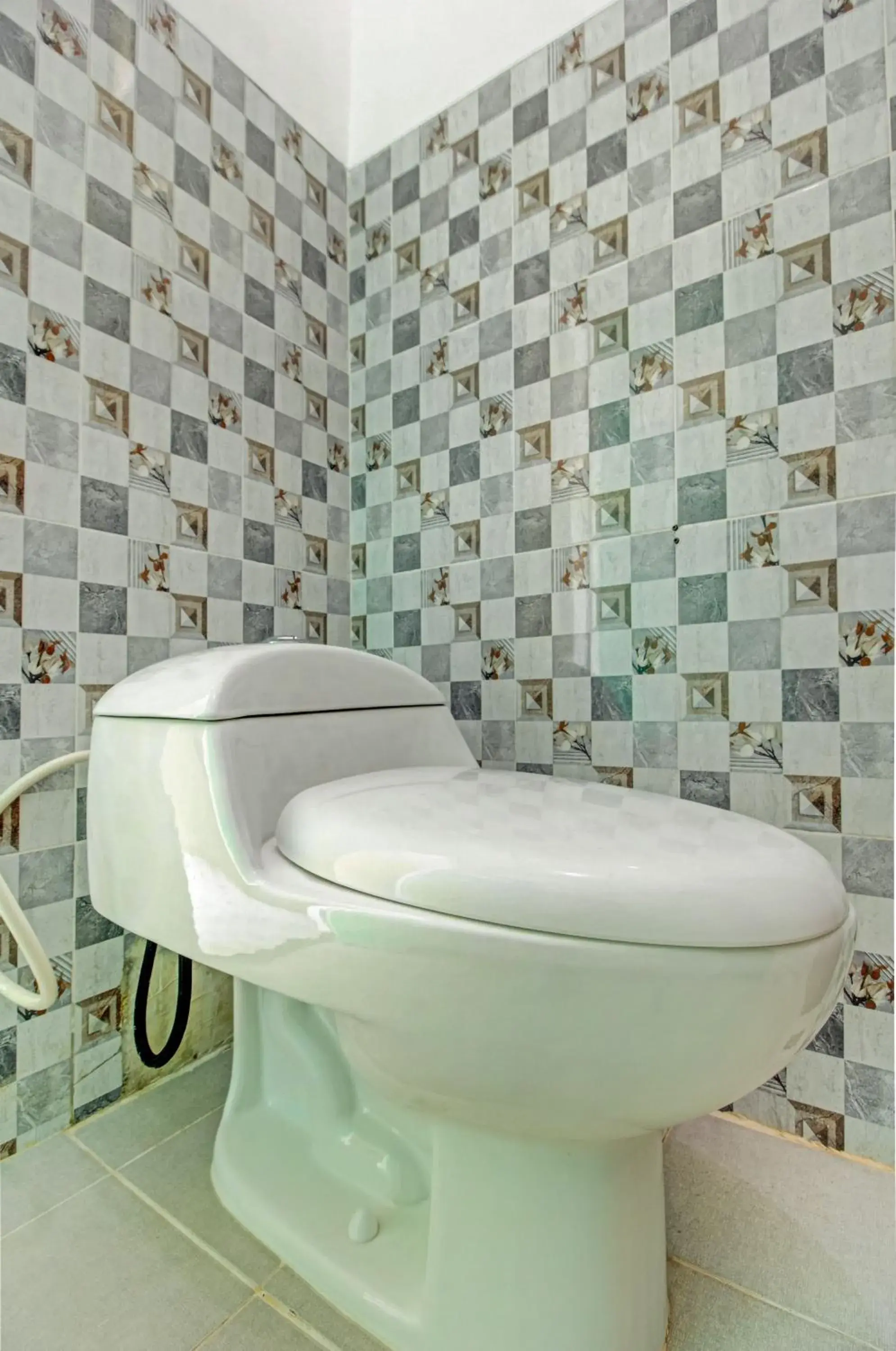 Bathroom in OYO 3774 Orchid 37 Syariah Guest House
