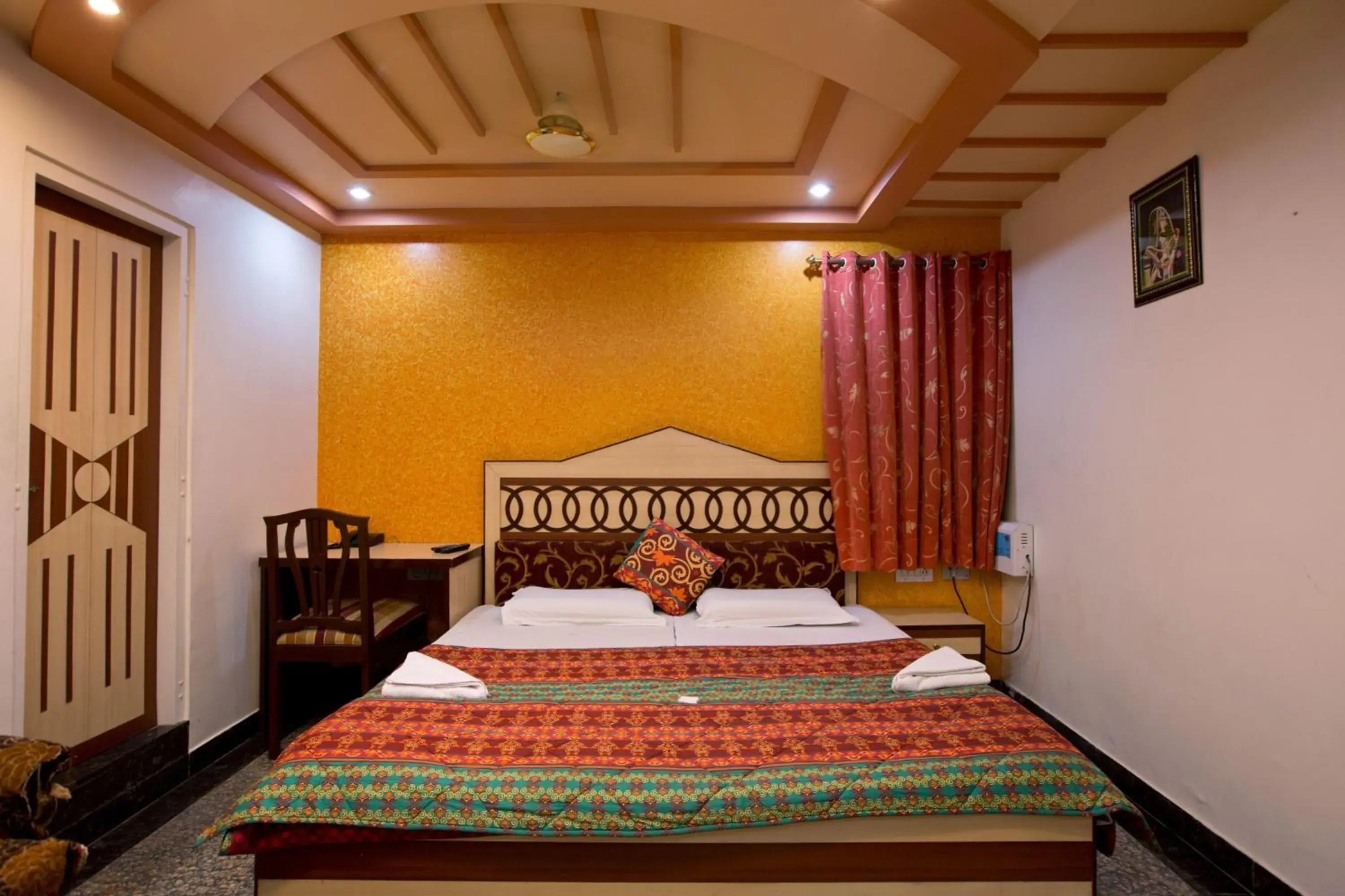 Bed in Hotel Kalyan