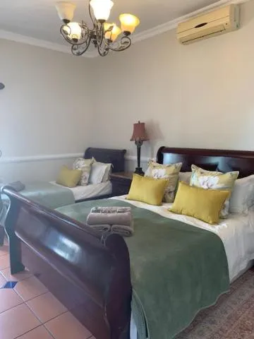 Bedroom, Bed in A Tapestry Garden Guest House