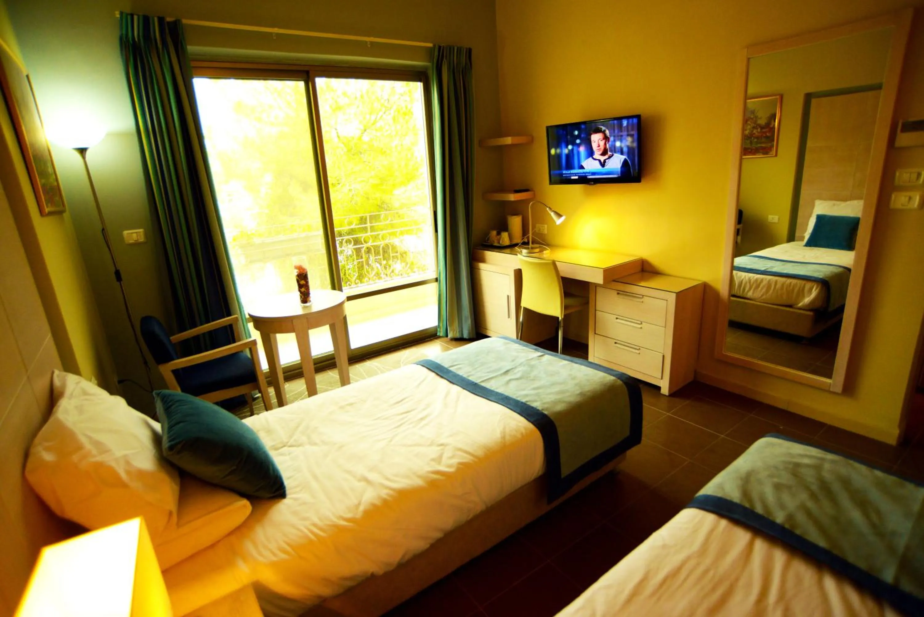 Photo of the whole room, Bed in Holy Land Hotel