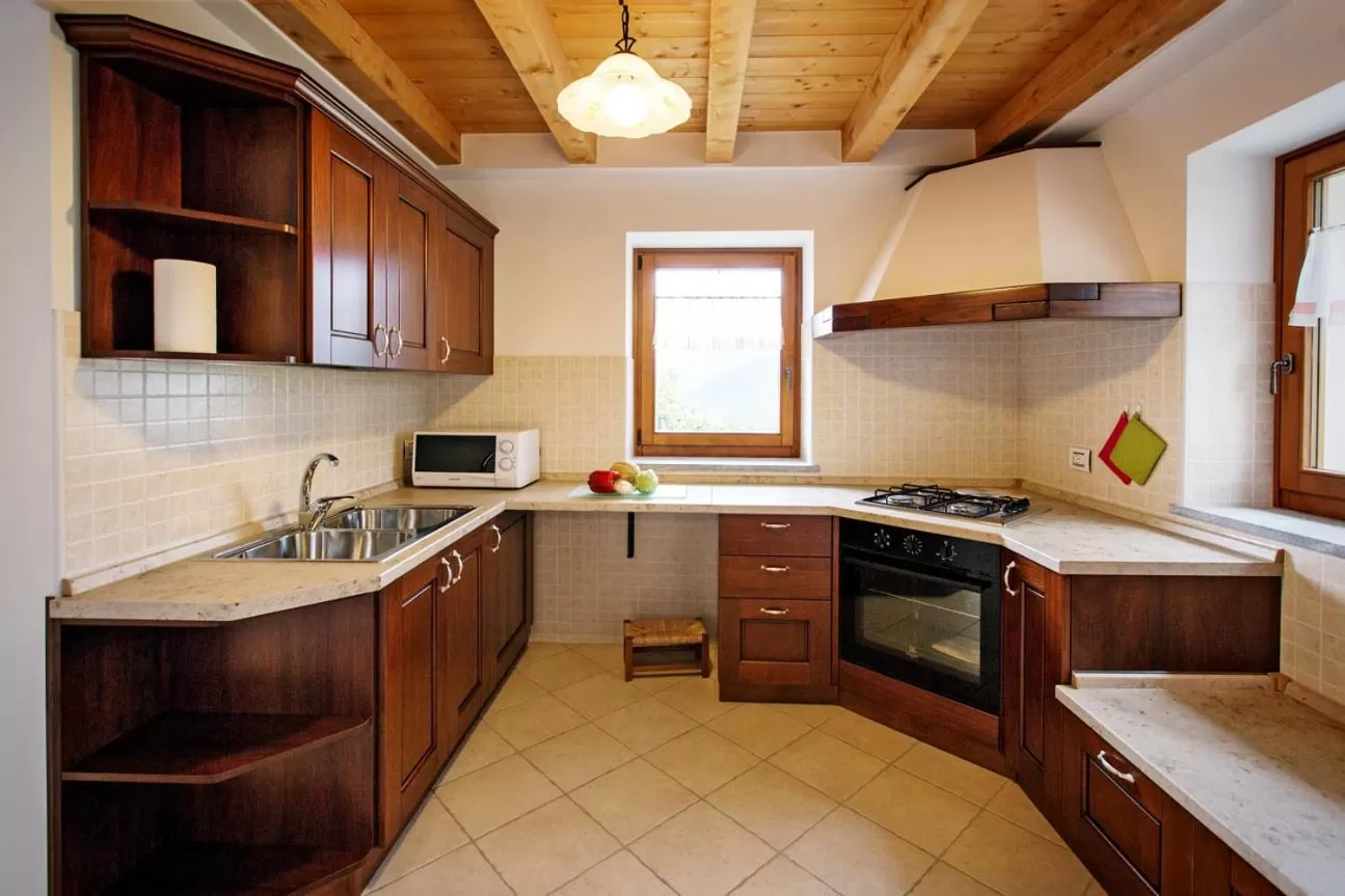 Kitchen or kitchenette in Albergo Diffuso Tolmezzo