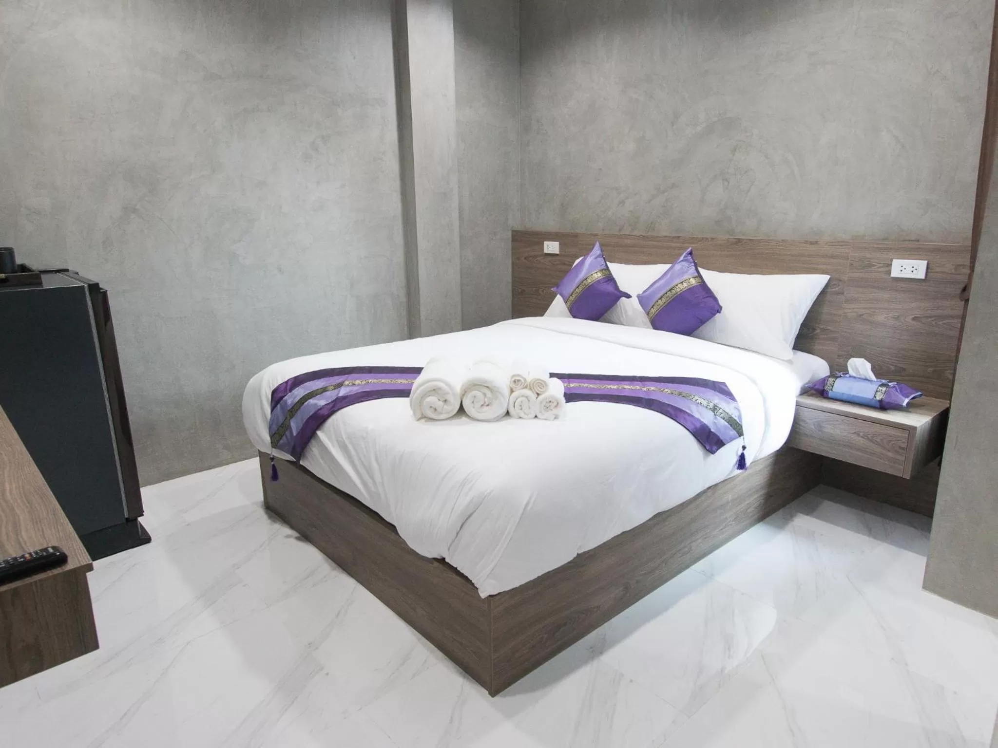 Bed in Puak Taem Boutique Hotel