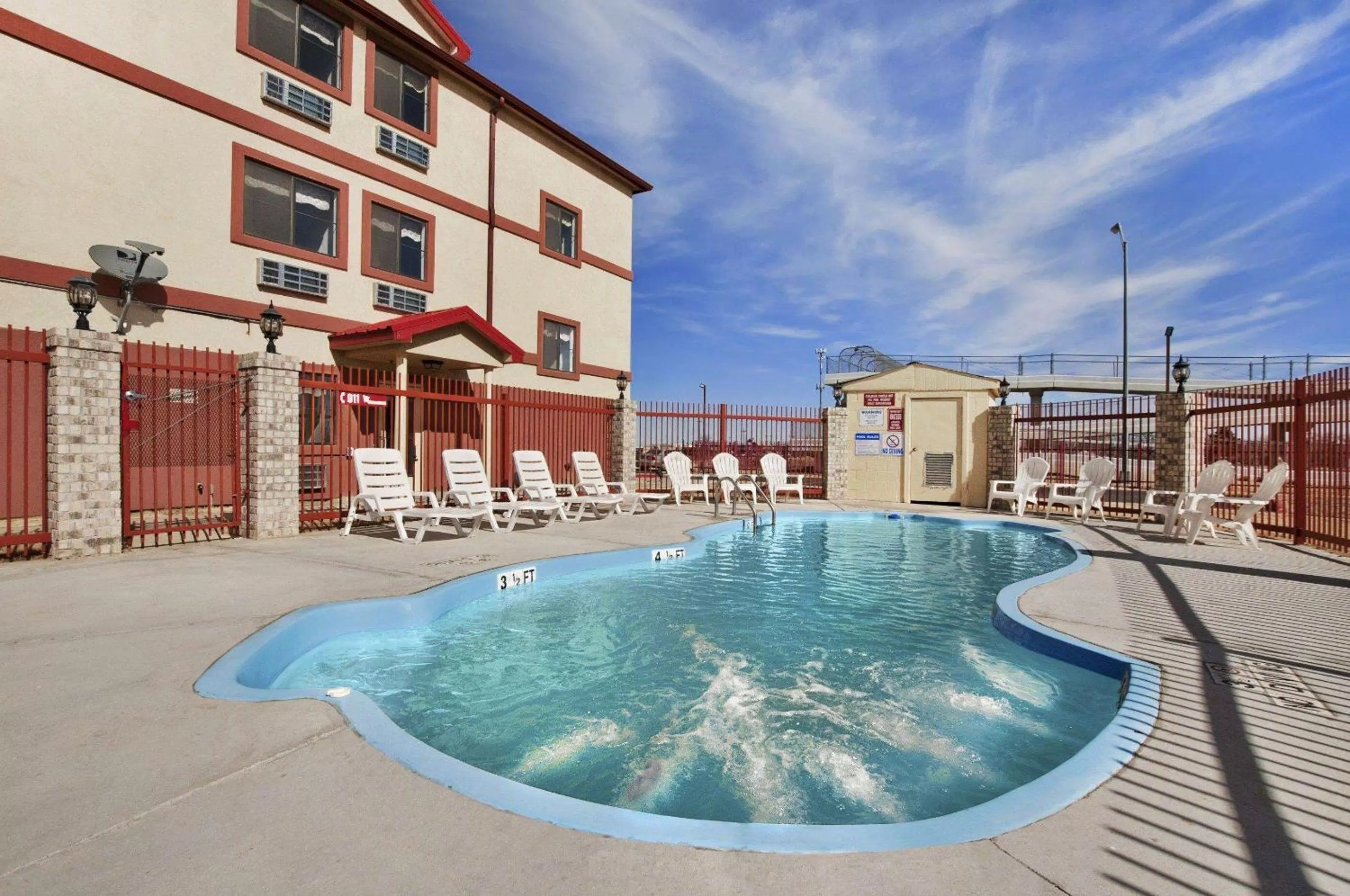 Pool view in Howard Johnson by Wyndham Lubbock TX