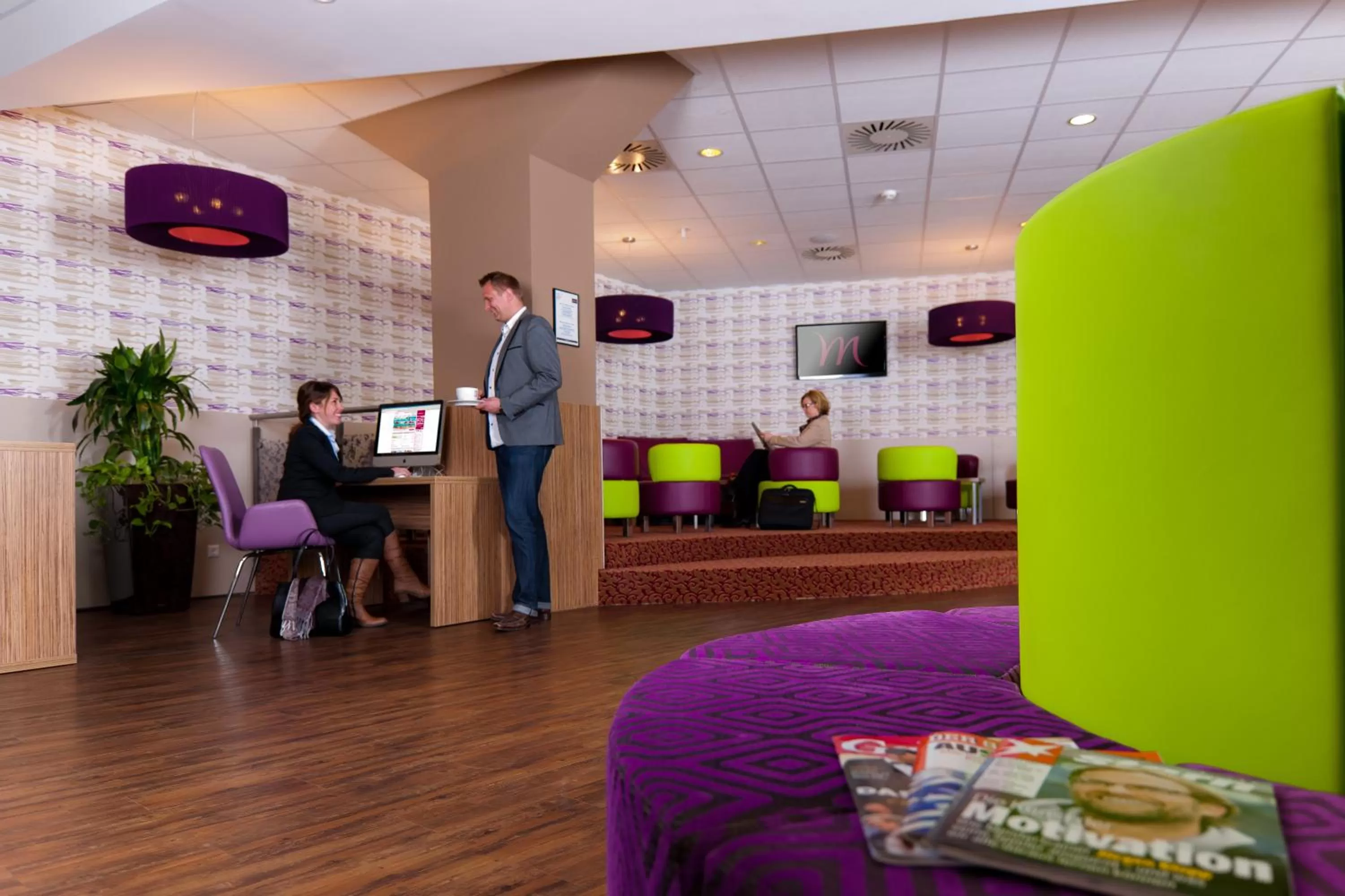 Communal lounge/ TV room in Mercure Hotel Hamburg am Volkspark