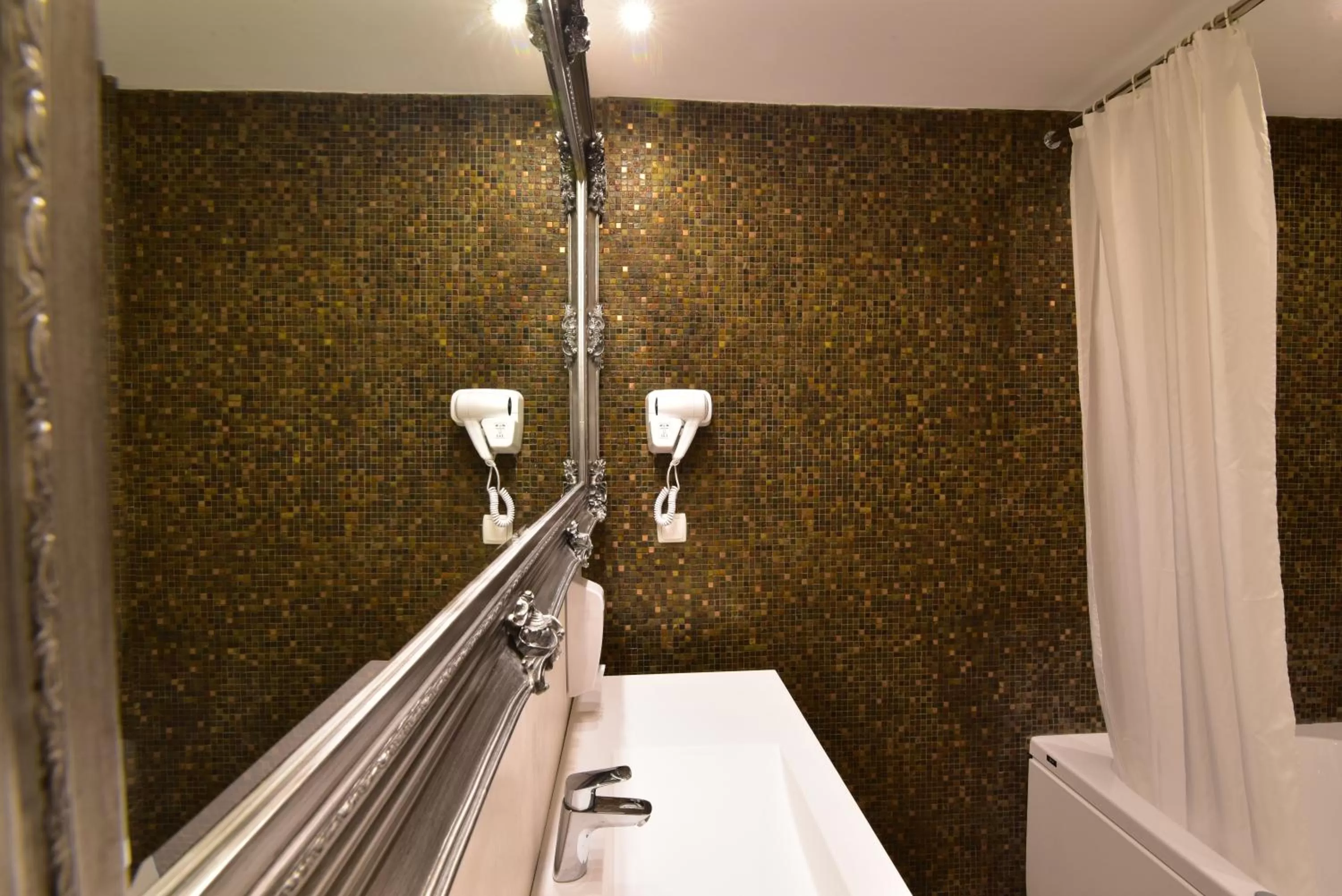 Bathroom in Hotel Forum