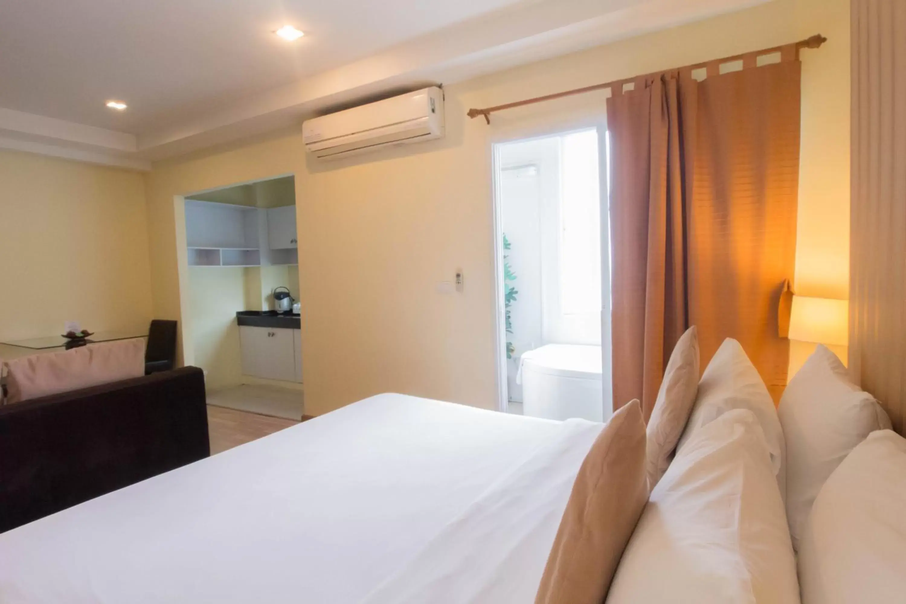 Bed in The Platinum Suite Bangkok