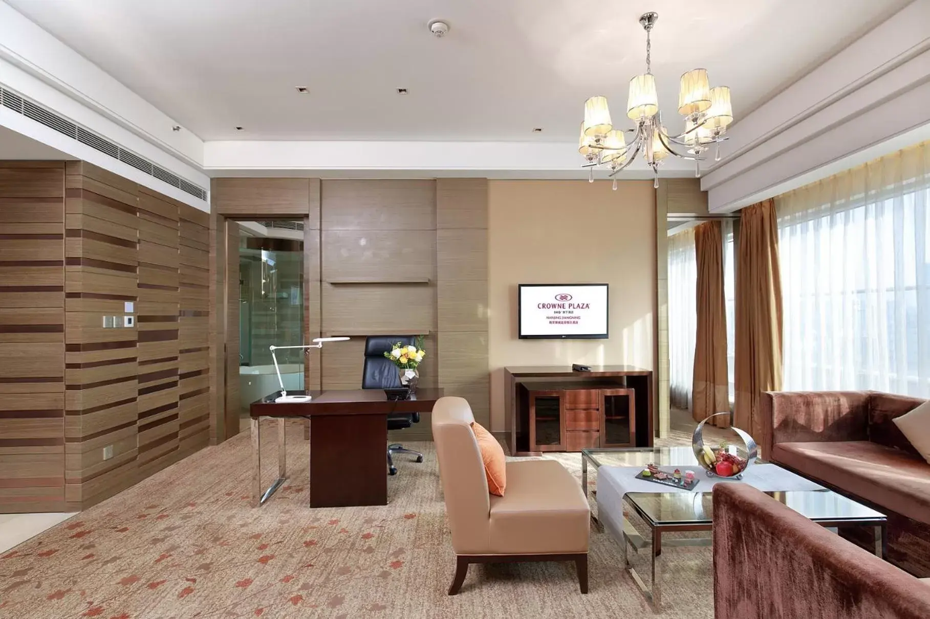 Living room, Seating Area in Crowne Plaza Nanjing Jiangning, an IHG Hotel