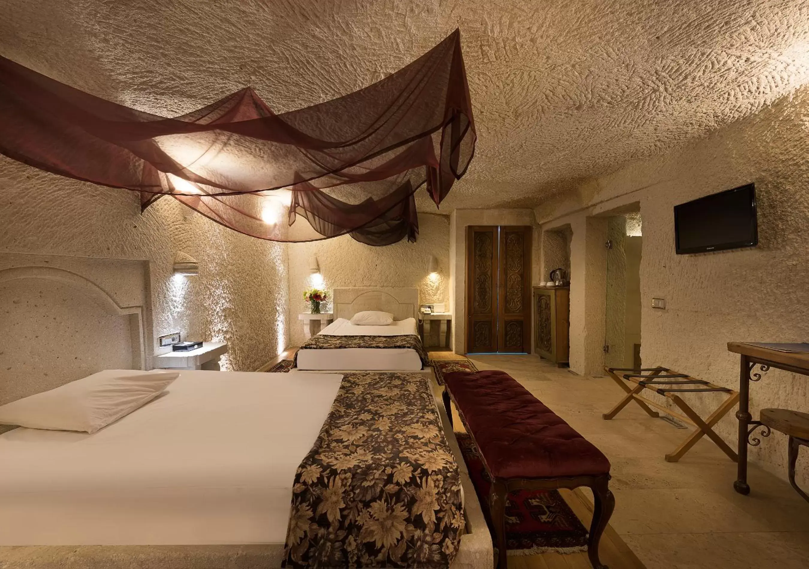 Bed in Anatolian Houses Cave Hotel & SPA