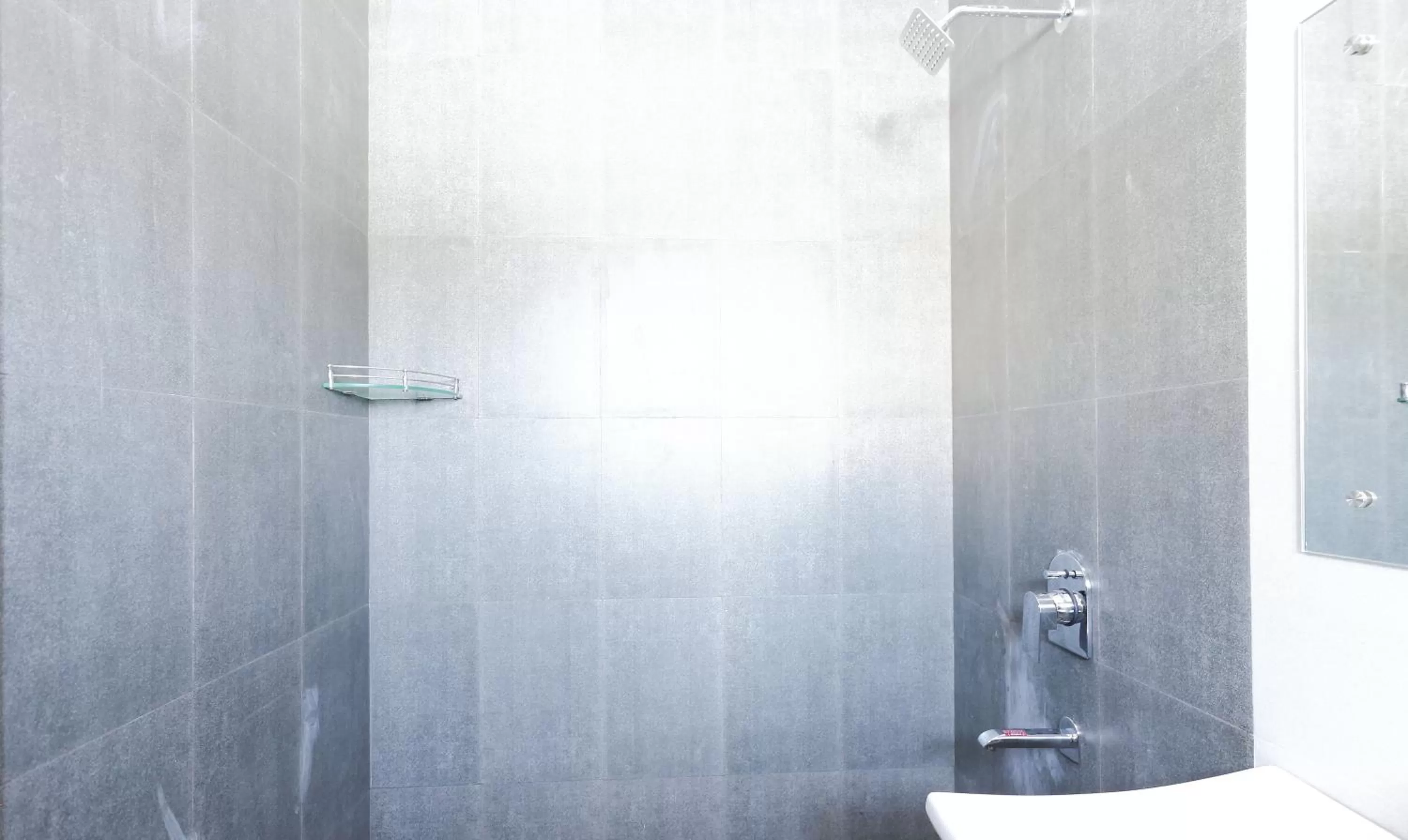 Bathroom in Treebo Hi Line Apartments Kalapatti