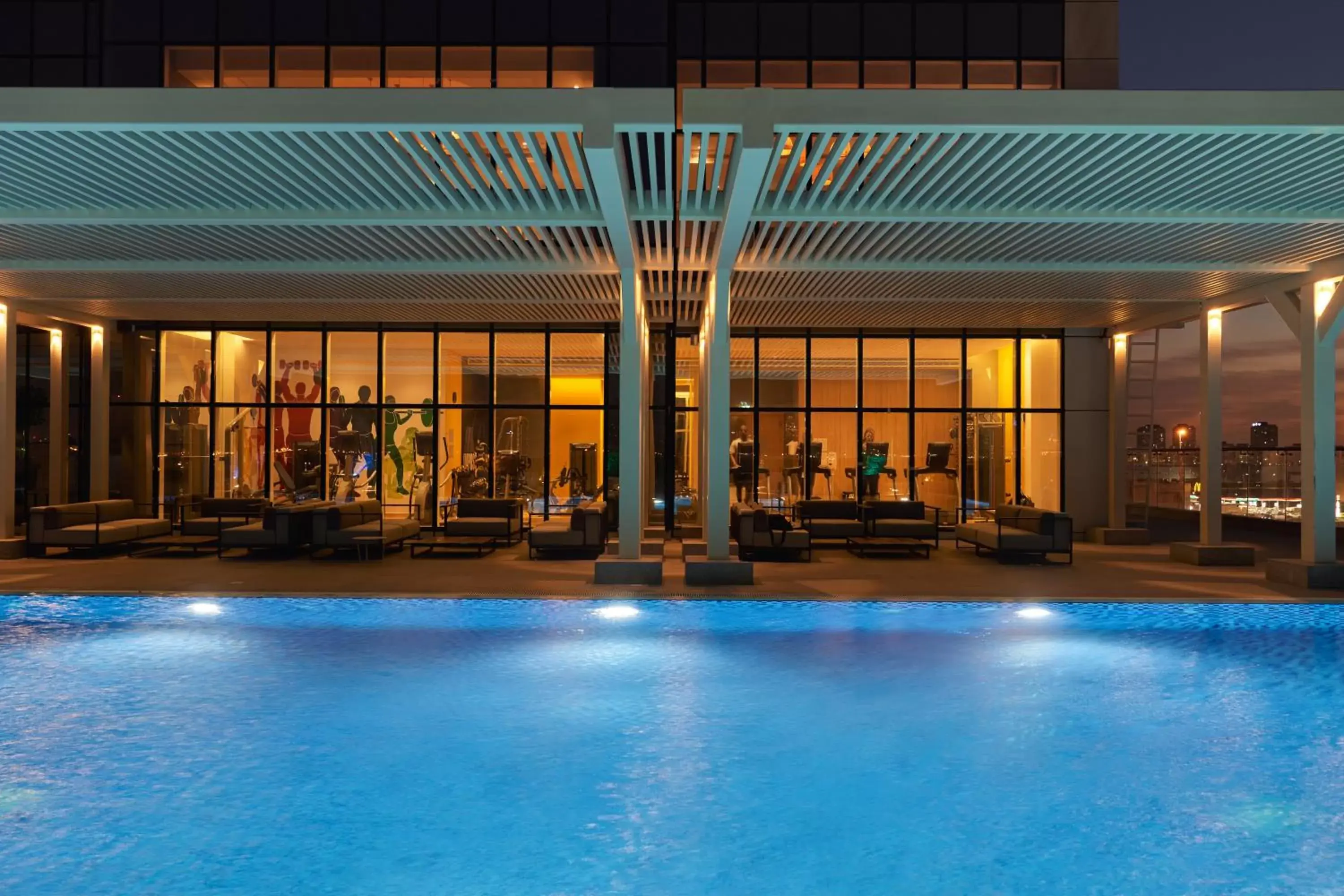 Fitness centre/facilities, Swimming Pool in Novotel Jumeirah Village Triangle