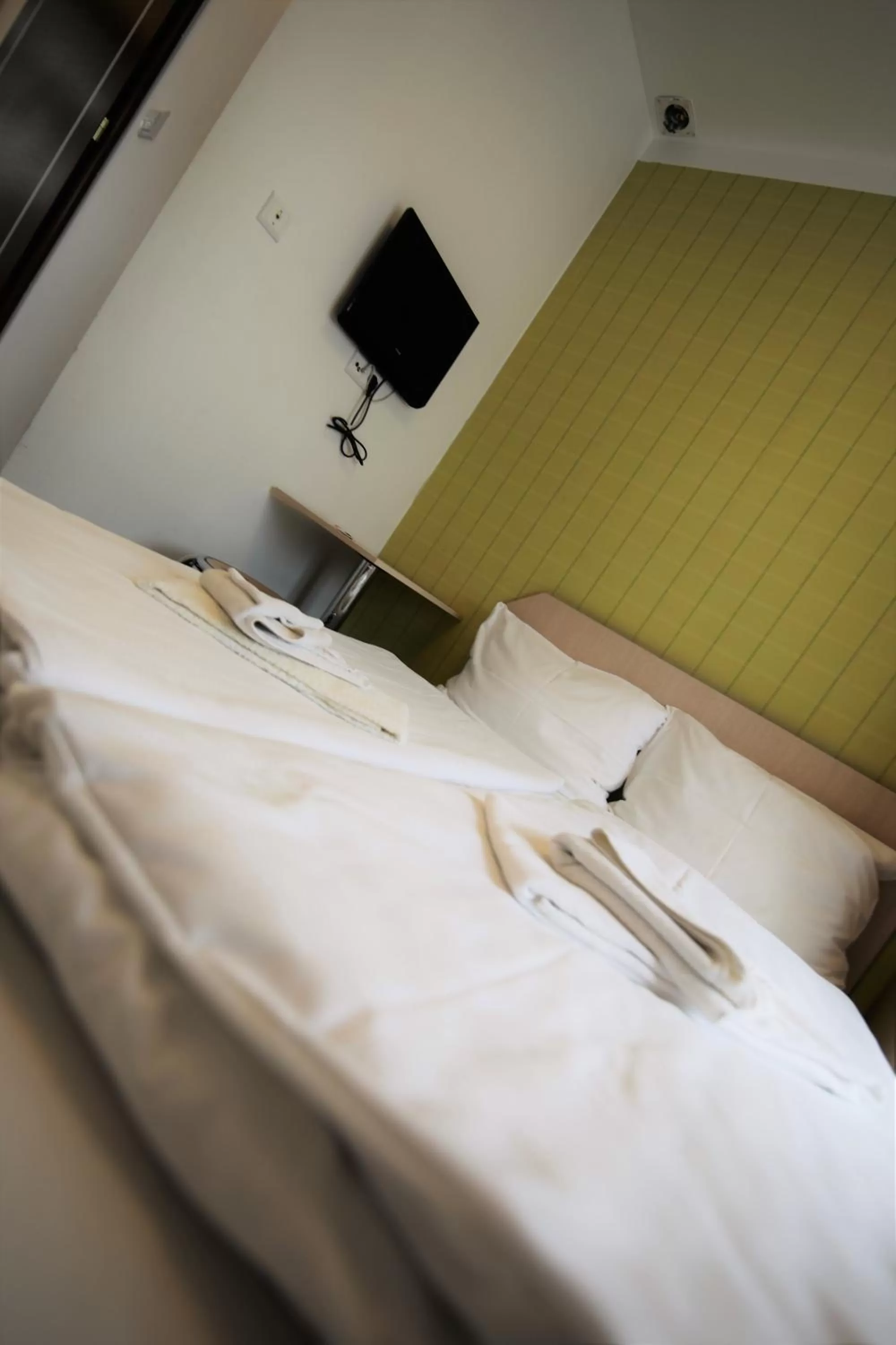 Bed in Akira Bed & Breakfast