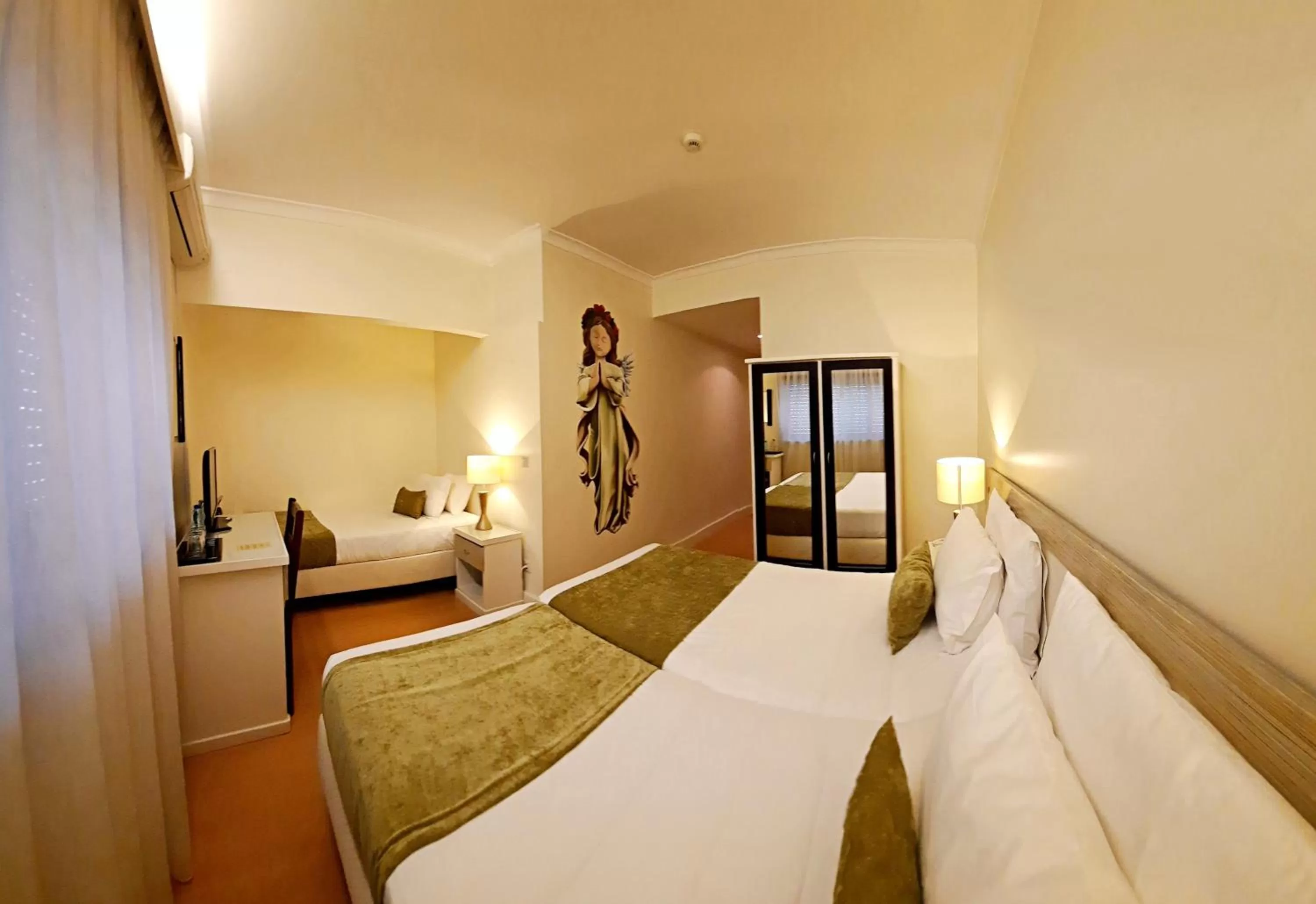 Bed in Hotel Aleluia