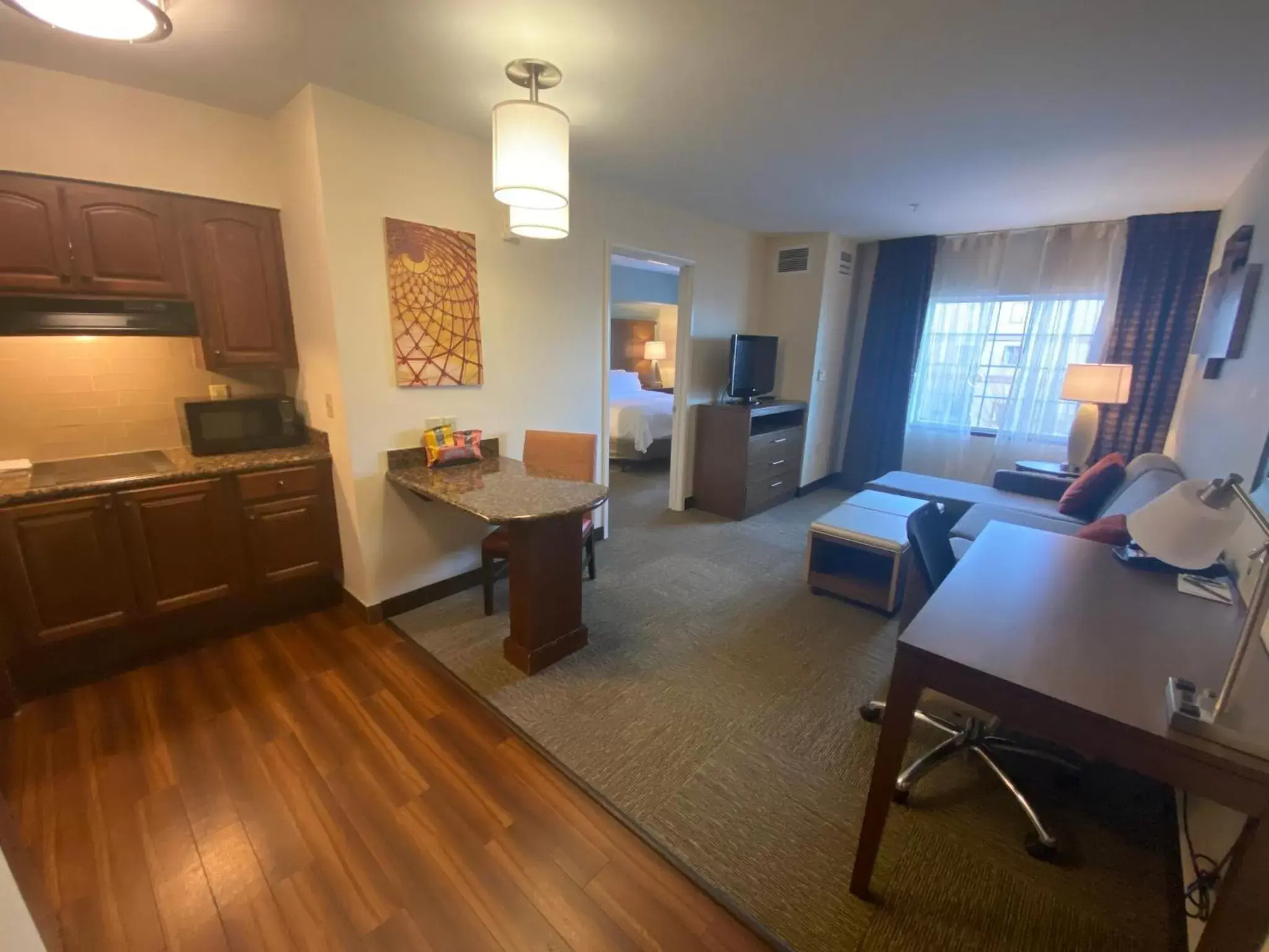 Bedroom, Seating Area in Staybridge Suites Great Falls, an IHG Hotel