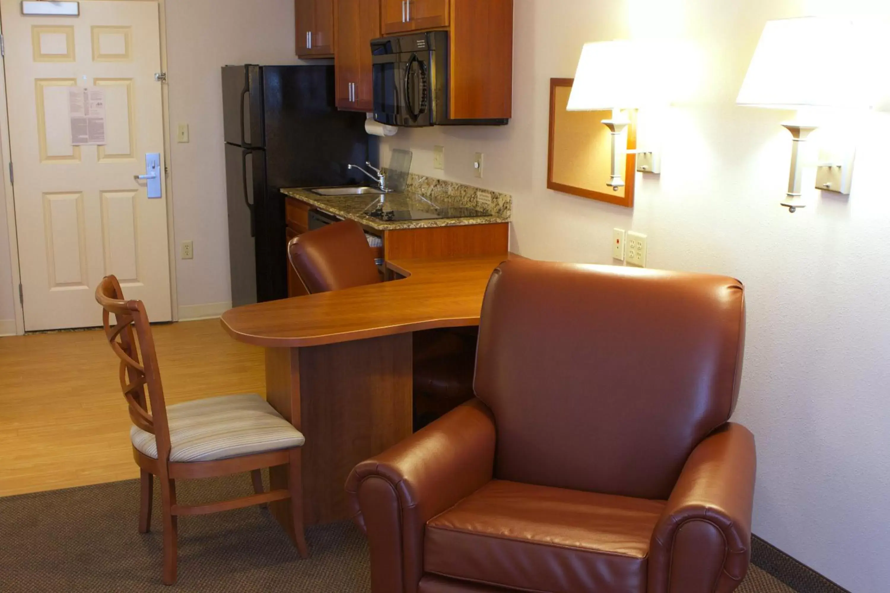 Photo of the whole room, Seating Area in Candlewood Suites Champaign-Urbana University Area, an IHG Hotel